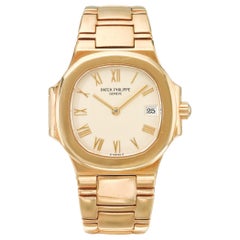 Patek Phillipe Ref 4700 Nautilus Yellow Gold Bracelet Watch with Date, 1993