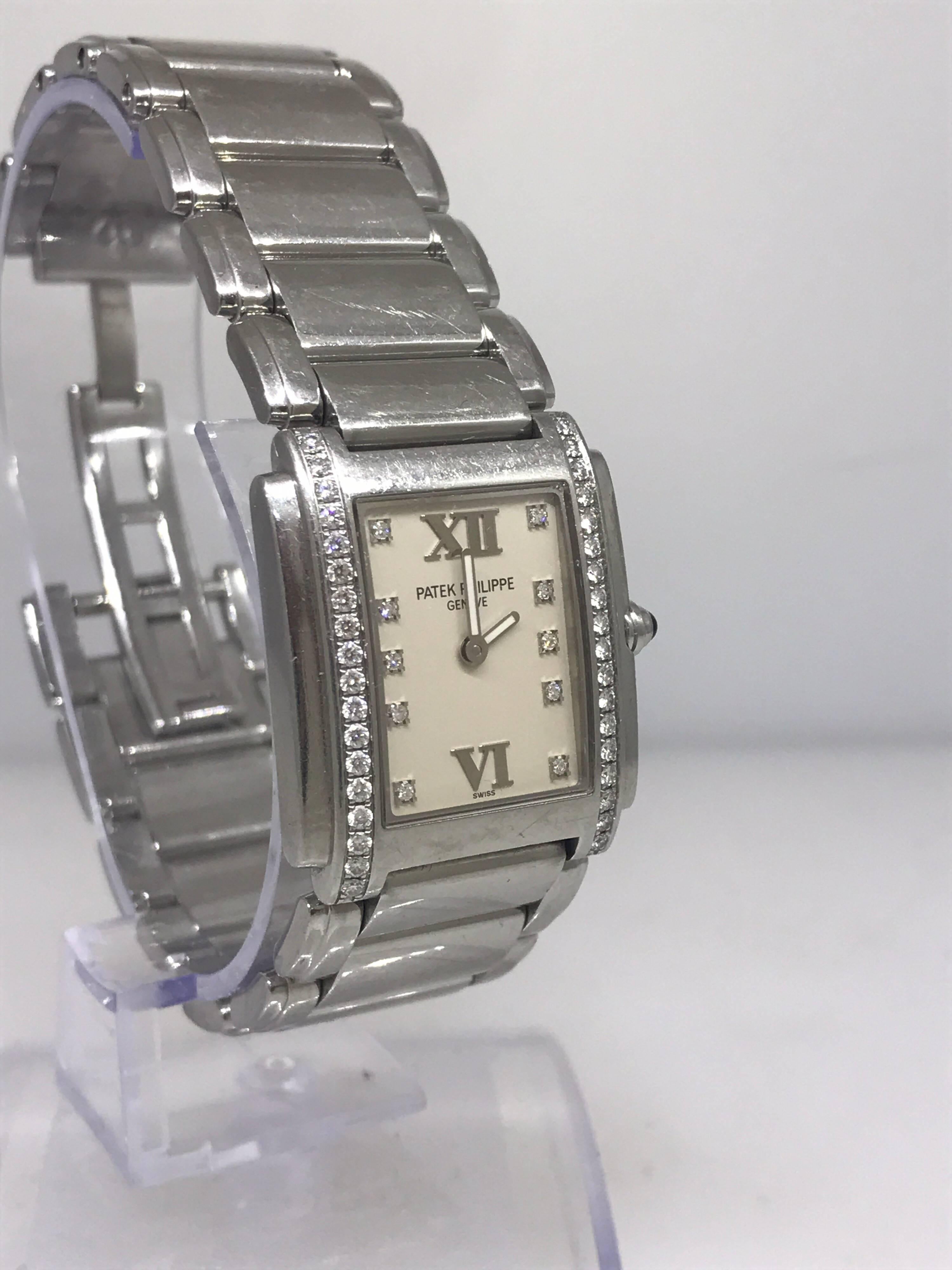 Patek Phillipe Twenty 4 Lady's Watch

Model Number: 4910/10A-011

100% Authentic

Pre-ownded - very good condition

Watch comes with original Patek Phillipe traveling box (as seen in photos)

Stainless Steel Case & Bracelet

Diamonds on either side