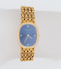 Patek Phillippe Blue Face Diamond and 18k Yellow Gold Women's Watch