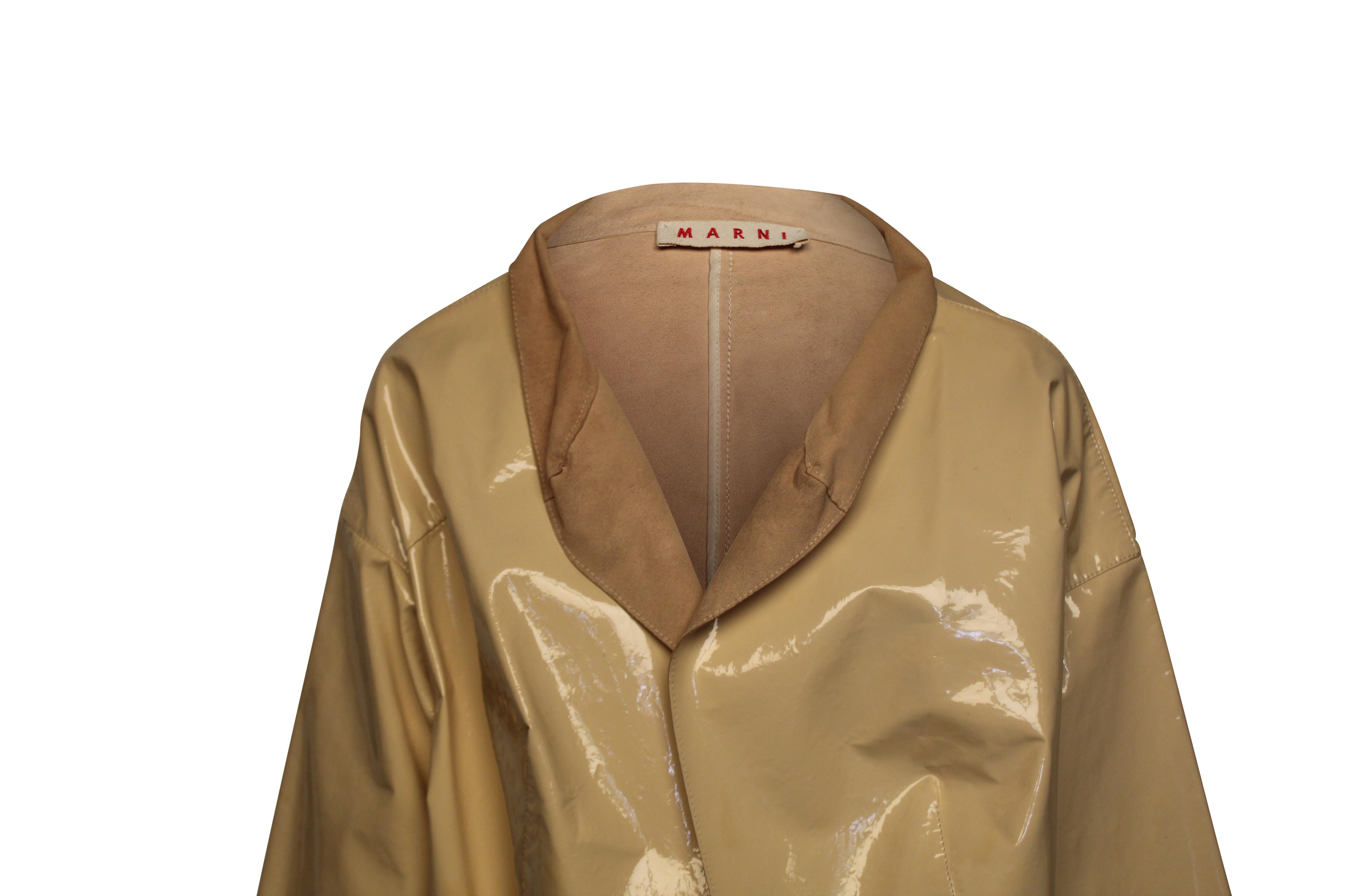Marni beige patent leather jacket with suede interior made from calf and sheep skin. Made in Italy. Size 42.

