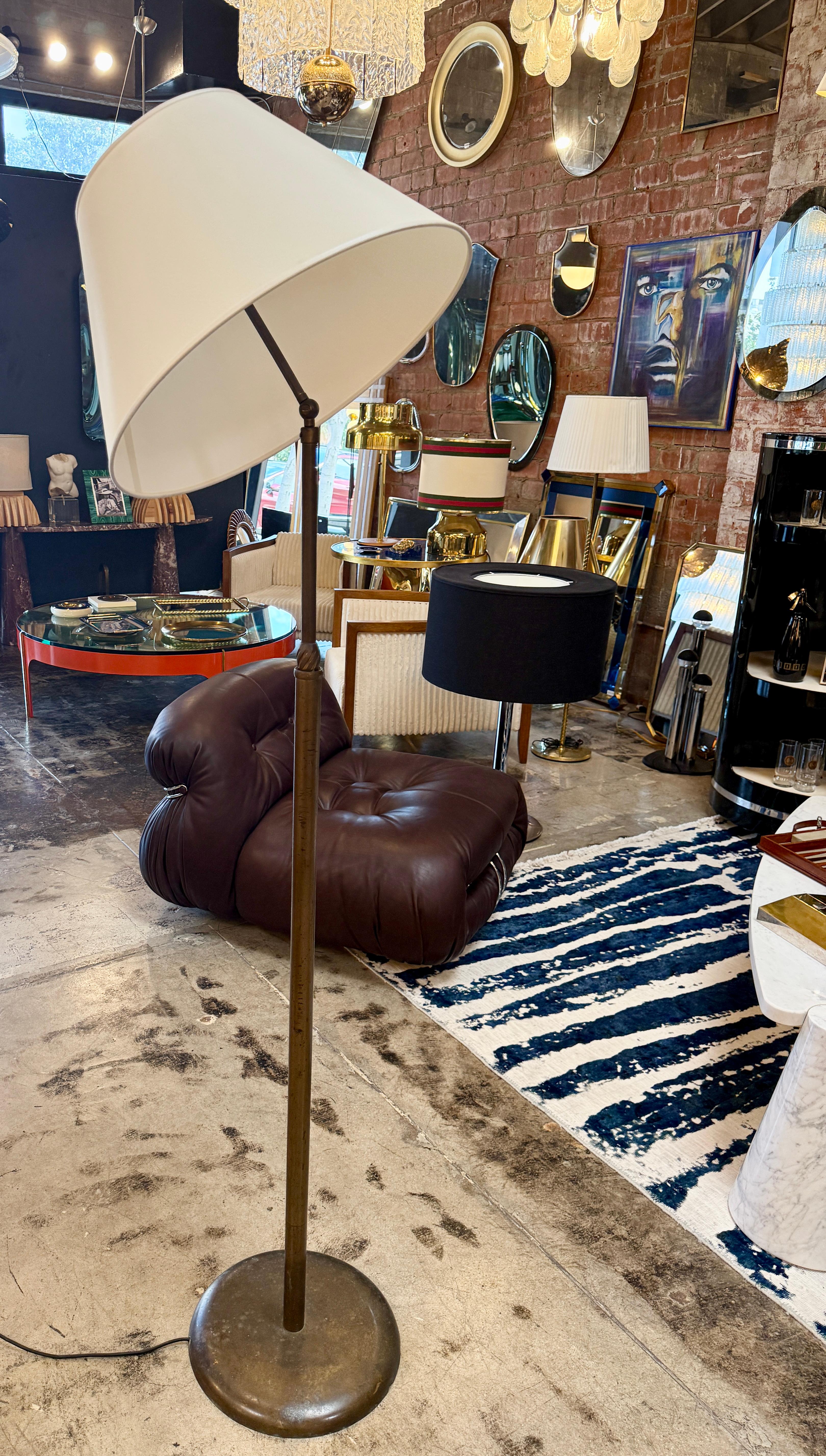Elegant mid-century floor lamp by Angelo Lelli for Arredoluce, Italy, 1950s, bearing the Brevettata (patented) marking. This rare model features both adjustable height and an adjustable angled shade, exemplifying Lelli’s mastery of functional yet