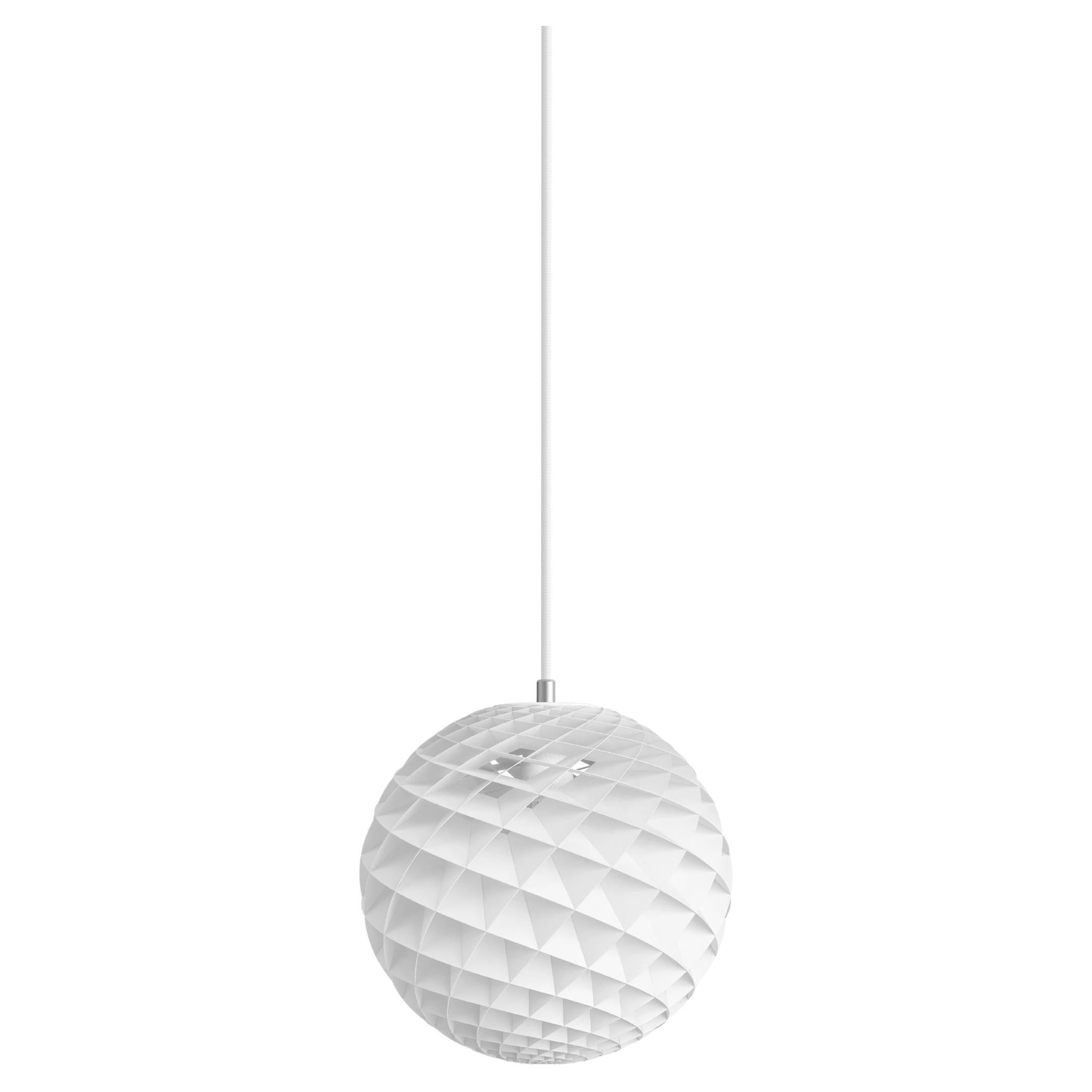 About This Product
The Patera pendant was designed by Øivind Slaatto, who based it on the mathematics of the Fibonacci sequence. The poetic 360-degree glow of the Patera is derived from its many small diamond-shaped cells, which are assembled by