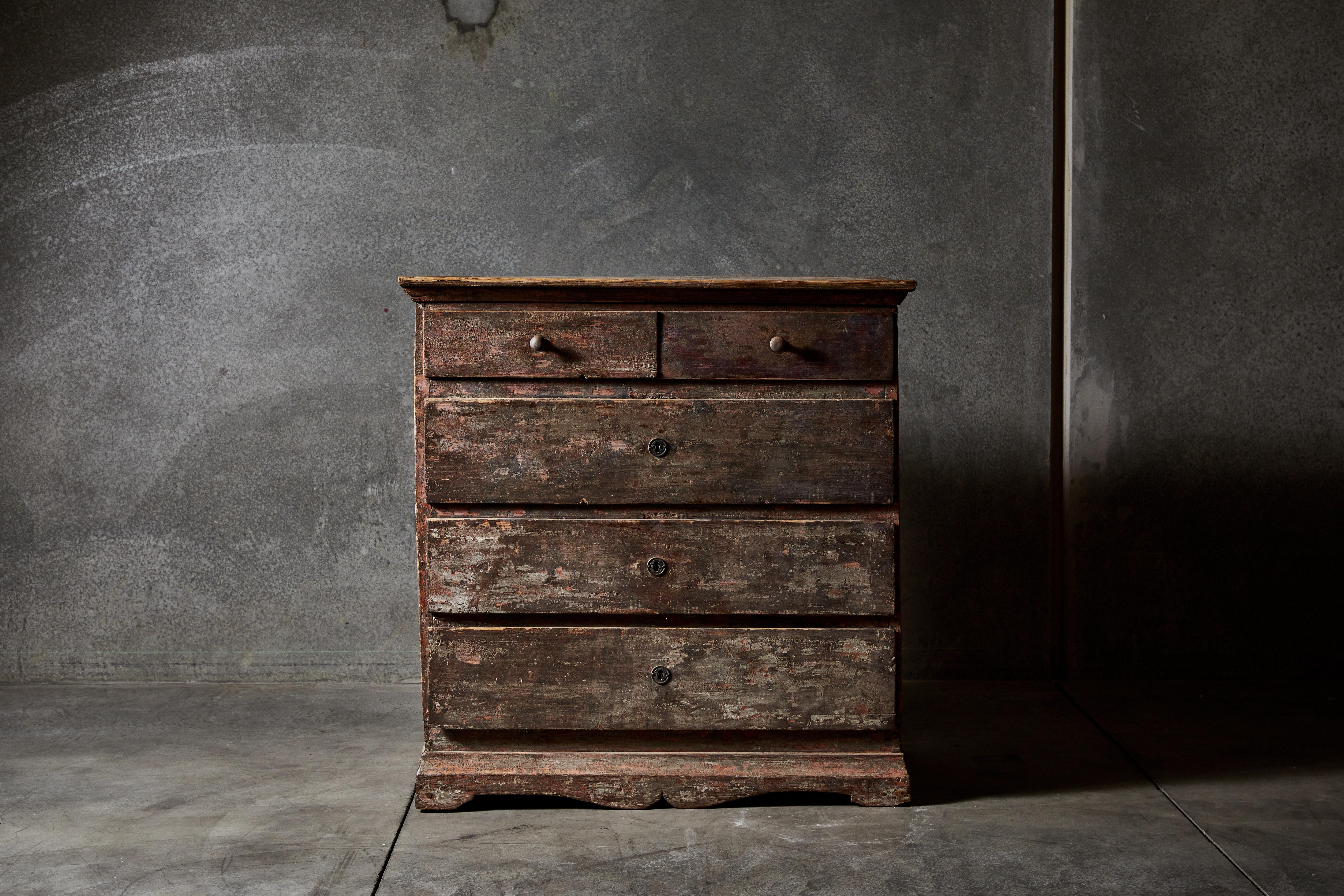 Painted rustic Swedish chest of drawers. Made in Sweden circa late 18th century.