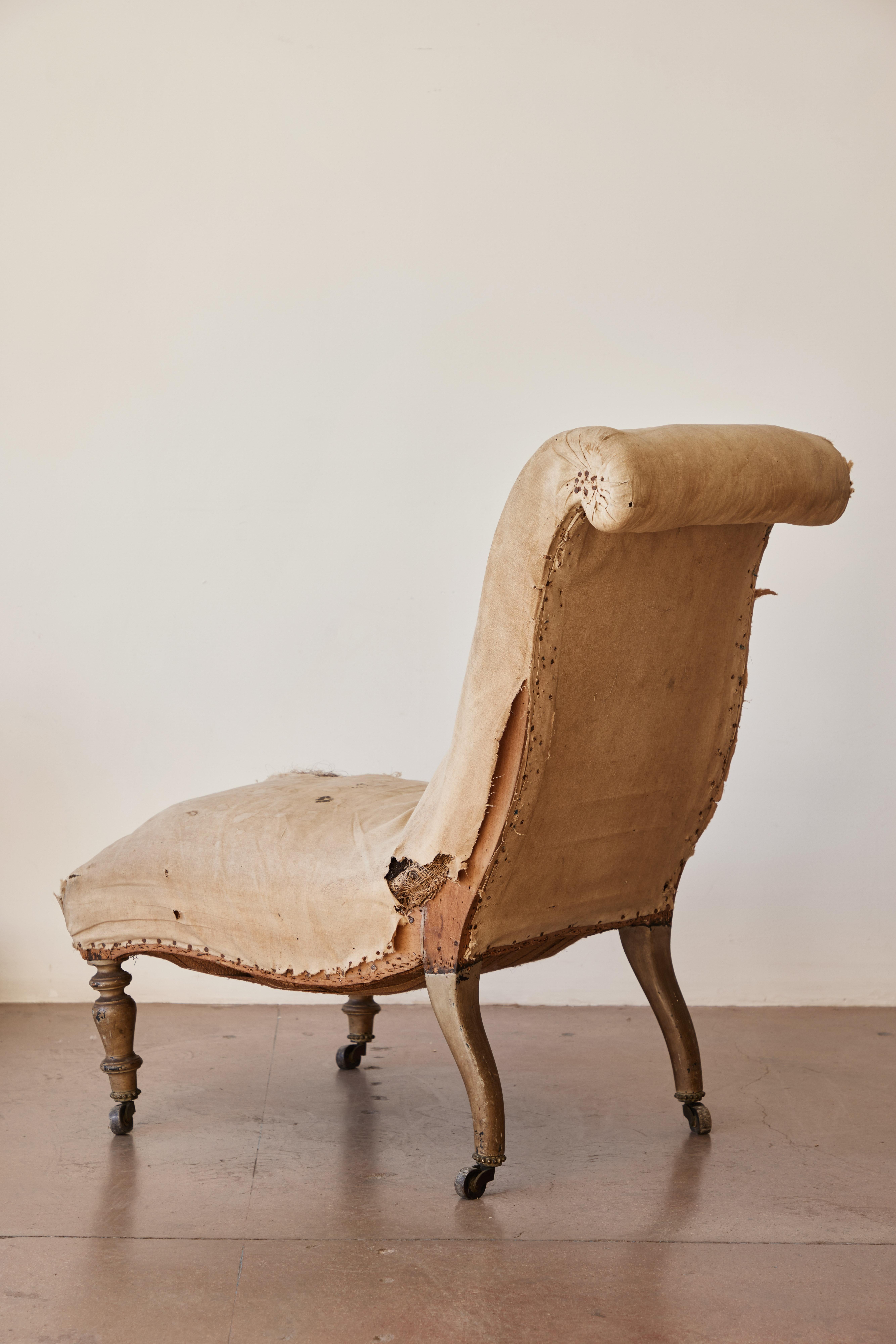 Patinated 19th Century French Slipper Chair In Distressed Condition In Los Angeles, CA