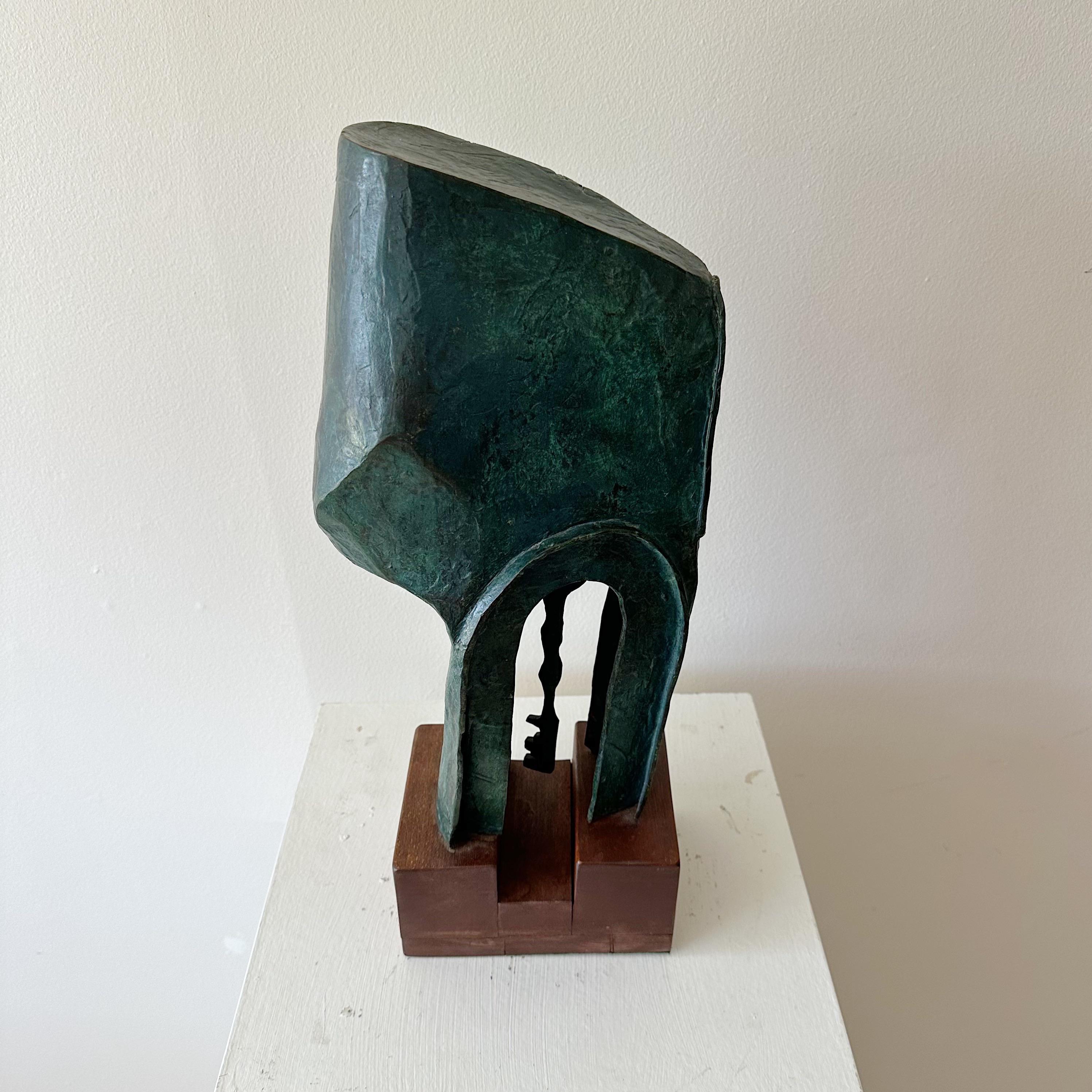 Abstract Patinated Bronze Sculpture on Wood Base with Hanging Keys

This exquisite and thought-provoking sculpture is a striking blend of abstract artistry and intriguing symbolism. Crafted from patinated bronze, the sculpture rests elegantly atop a