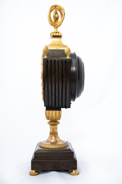 Orologio patinato e dorato a fuoco a forma di vaso c. 1800