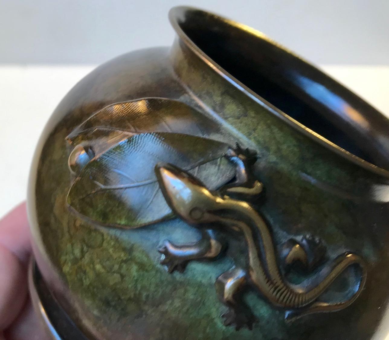 Danish 1930s interpretation of Japanese Meiji period where snakes, lizards and crocodiles were configured upon organically shaped and rather 'modernistic' bronze vases and bowls. This small vase was designed and manufactured by Holger Fredericia -