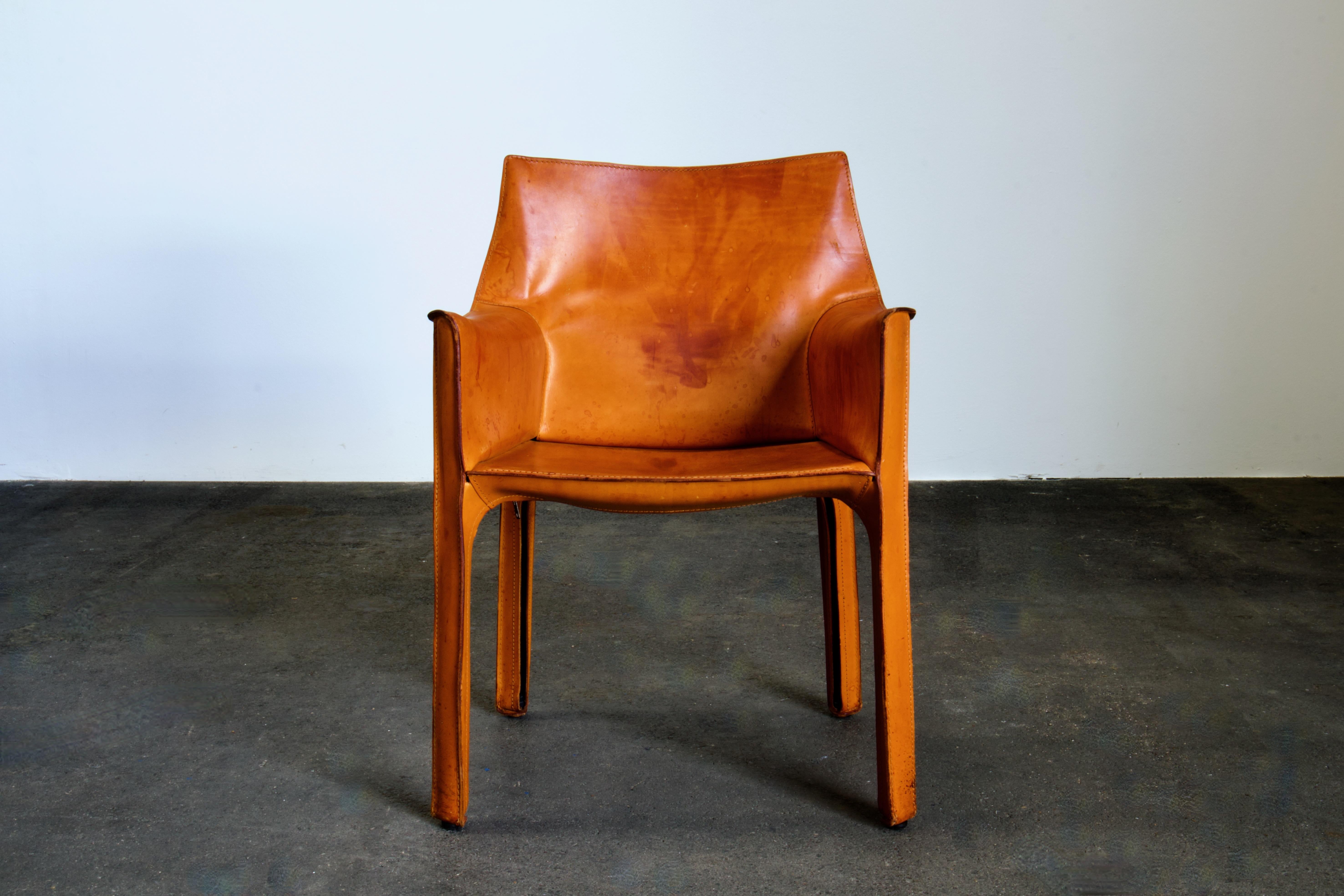 Exquisite original Mario Bellini CAB 413 chairs, a true emblem of timeless design. Manufactured by the renowned Italian design house, Cassina, in the 1970s, these chairs represent a perfect amalgamation of form and function.

Key