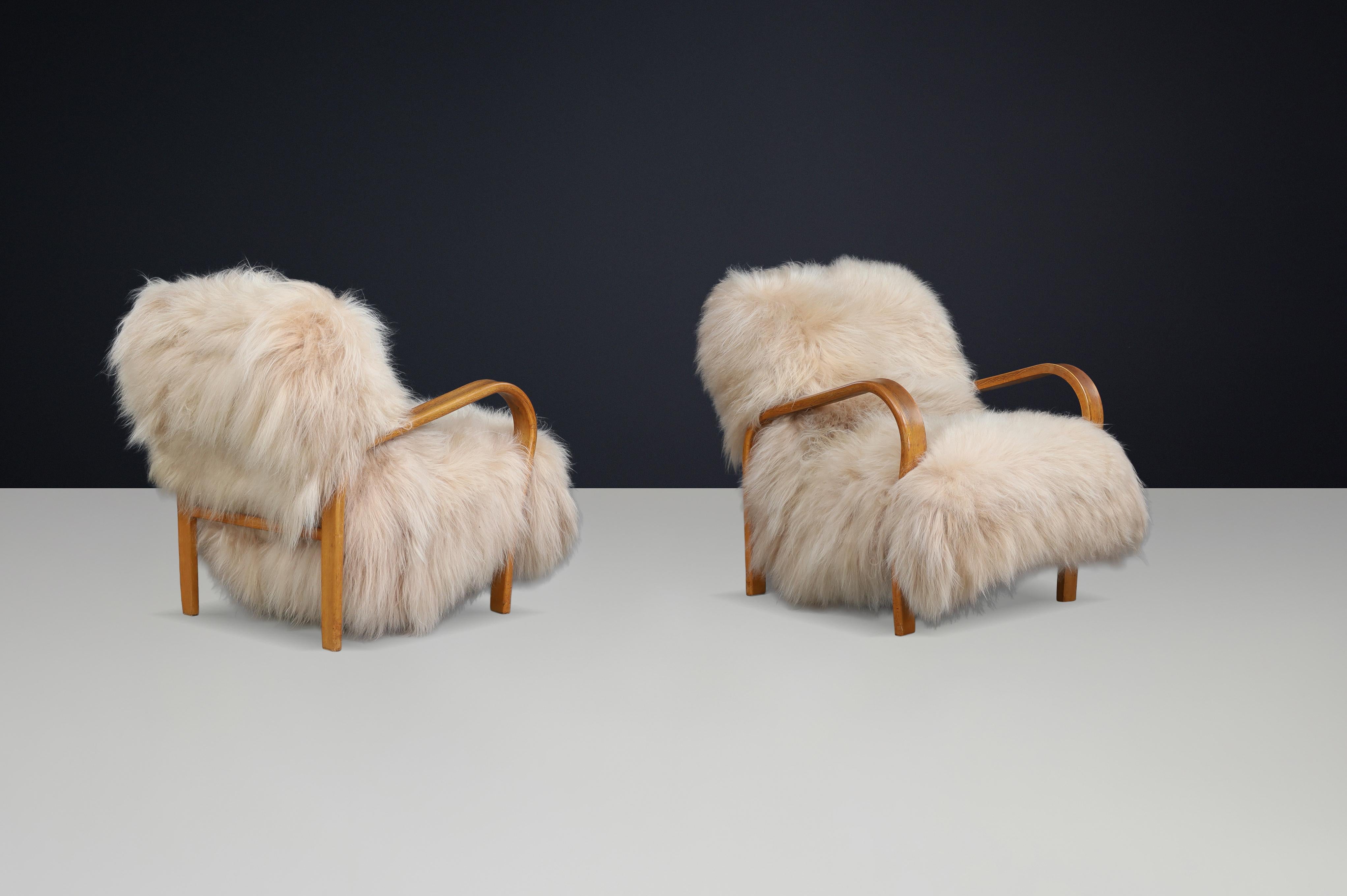 Patinated Bentwood Lounge Chairs by Kozelka & Kropáček in Long-Haired Icelandic For Sale 4