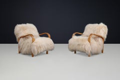 Patinated Bentwood Lounge Chairs by Kozelka & Kropáček in Long-Haired Icelandic.