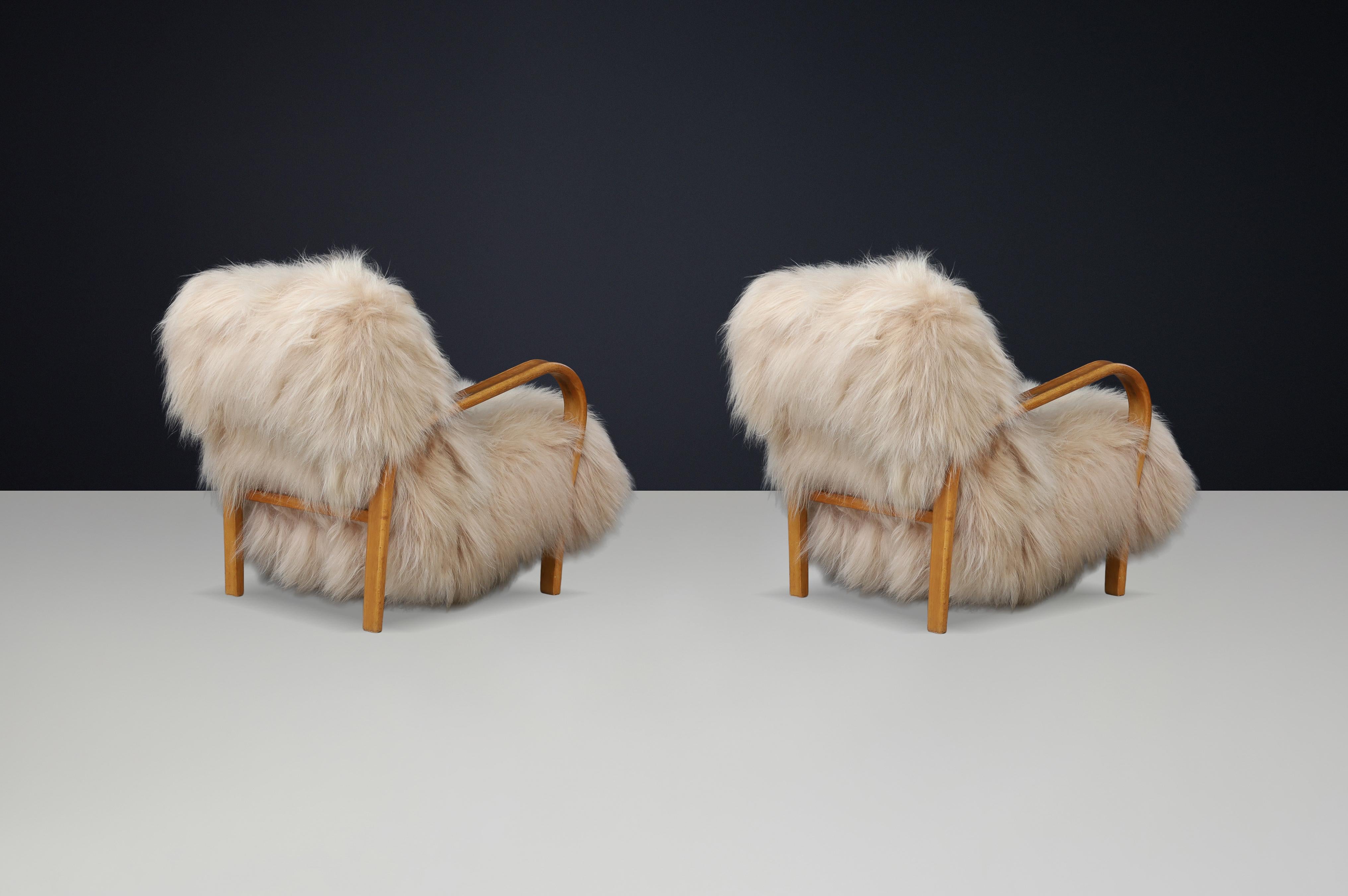 Czech Patinated Bentwood Lounge Chairs by Kozelka & Kropáček in Long-Haired Icelandic For Sale