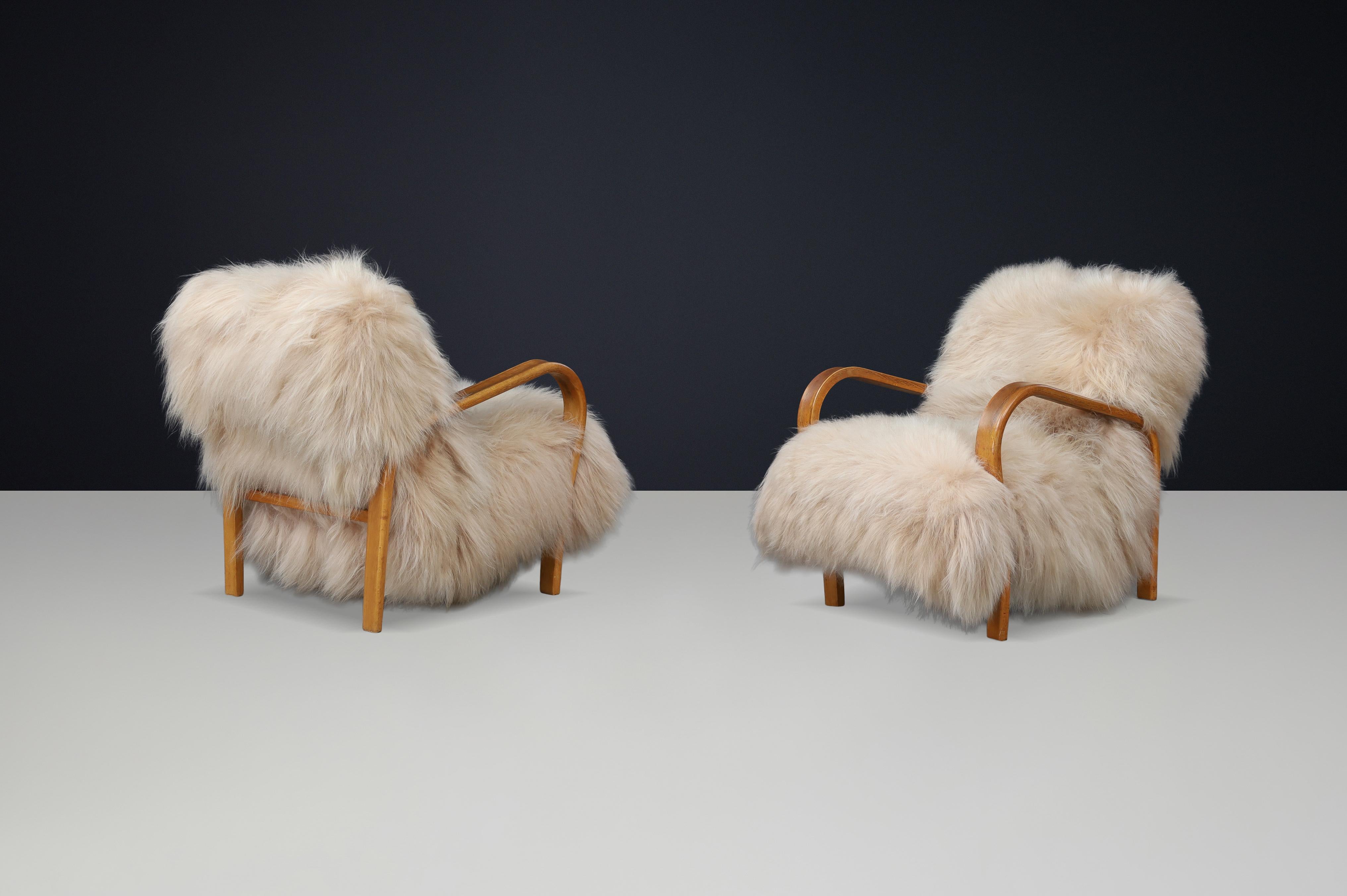 Sheepskin Patinated Bentwood Lounge Chairs by Kozelka & Kropáček in Long-Haired Icelandic For Sale