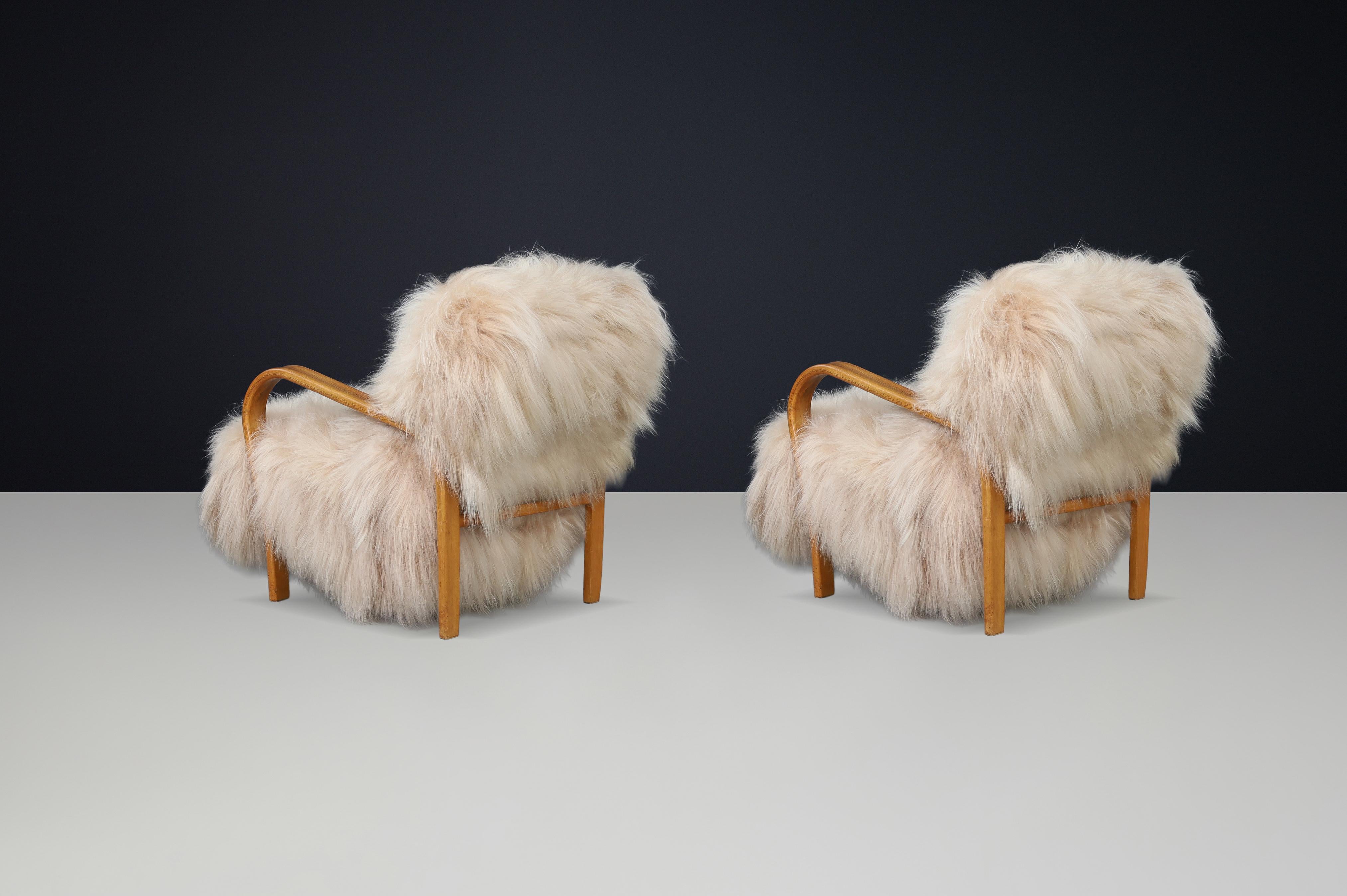 Patinated Bentwood Lounge Chairs by Kozelka & Kropáček in Long-Haired Icelandic For Sale 1