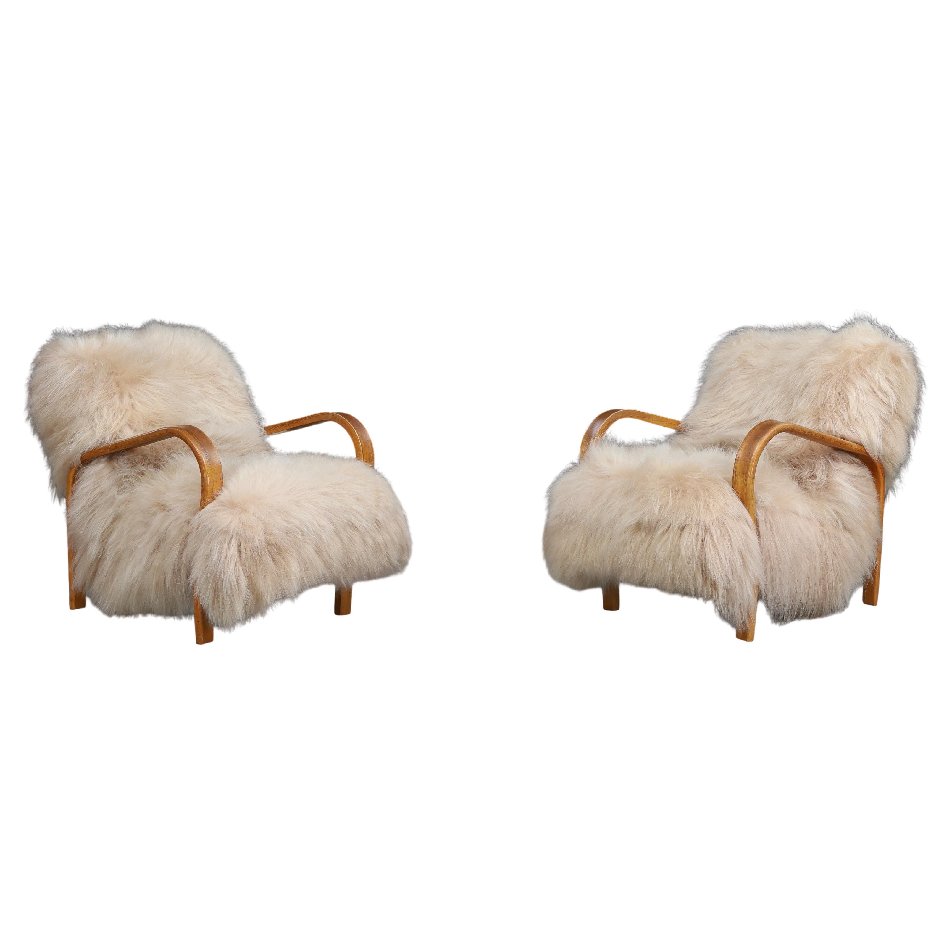 Patinated Bentwood Lounge Chairs by Kozelka & Kropáček in Long-Haired Icelandic For Sale
