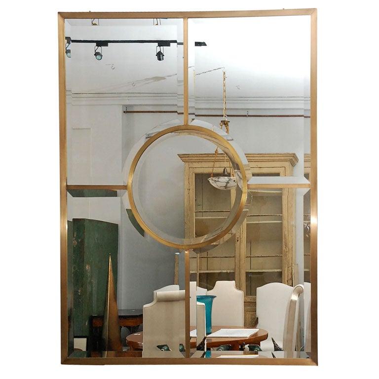 Solid patinated brass (not plated) and beveled glass 'Quadrature' mirror by Design Frères.

Impressive scale. Chic and understated.