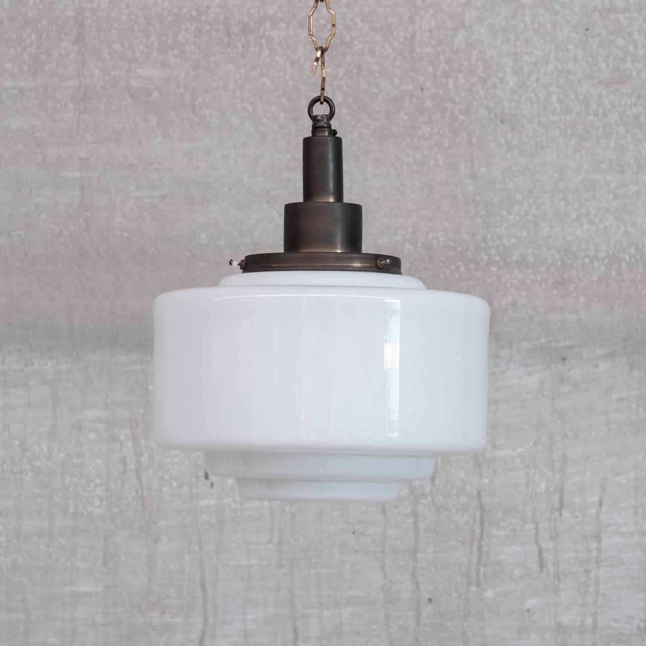 An opaline glass pendant light. 

France, c1950s. 

Naturally patinated glass gallery. 

No original chain or rose was retained but can be soruced easily online to taste. 

Re-wired and PAT tested since. 

Location: Belgium Gallery.