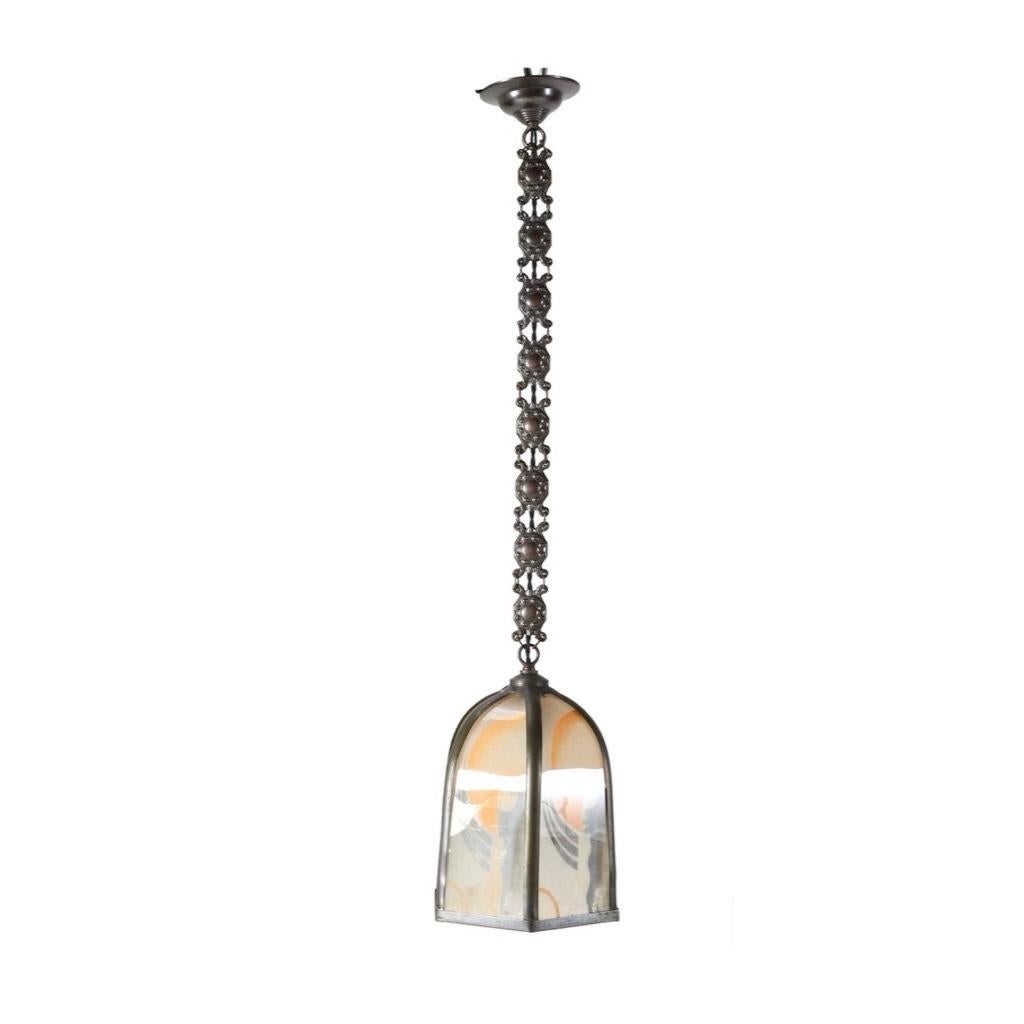 Stunning and elegant Art Deco Amsterdamse School pendant lamp.
Striking Dutch design from the 1920s.
Original patinated brass with original glass shades, hand-painted with the typical Amsterdamse School Tuschinski decorations.
Rewired with one