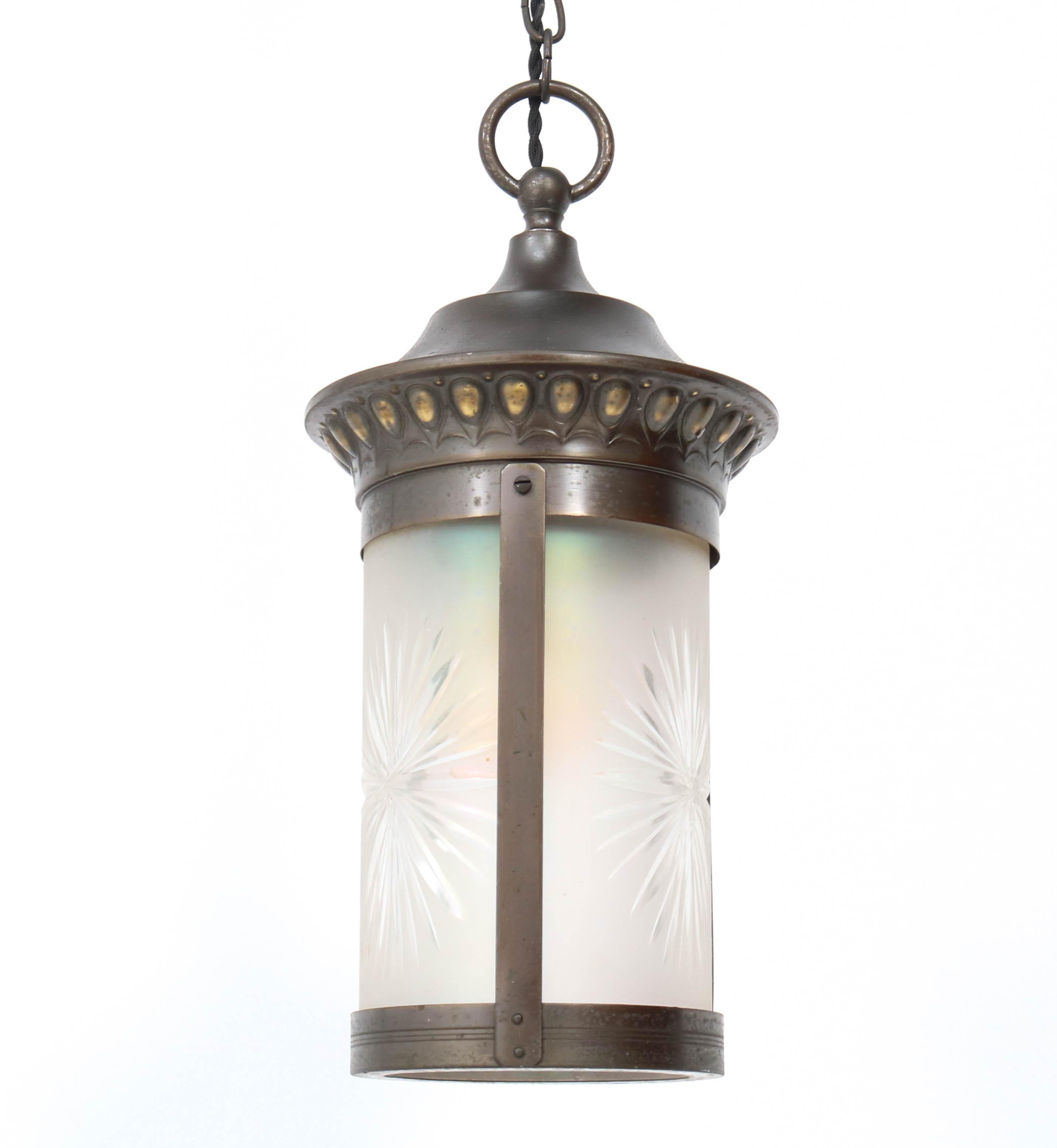 Wonderful Art Nouveau lantern.
Striking Dutch design from the 1900s.
Patinated brass frame with original etched glass.
Rewired with one socket for E27 light bulb.
In very good condition with a beautiful patina.
 