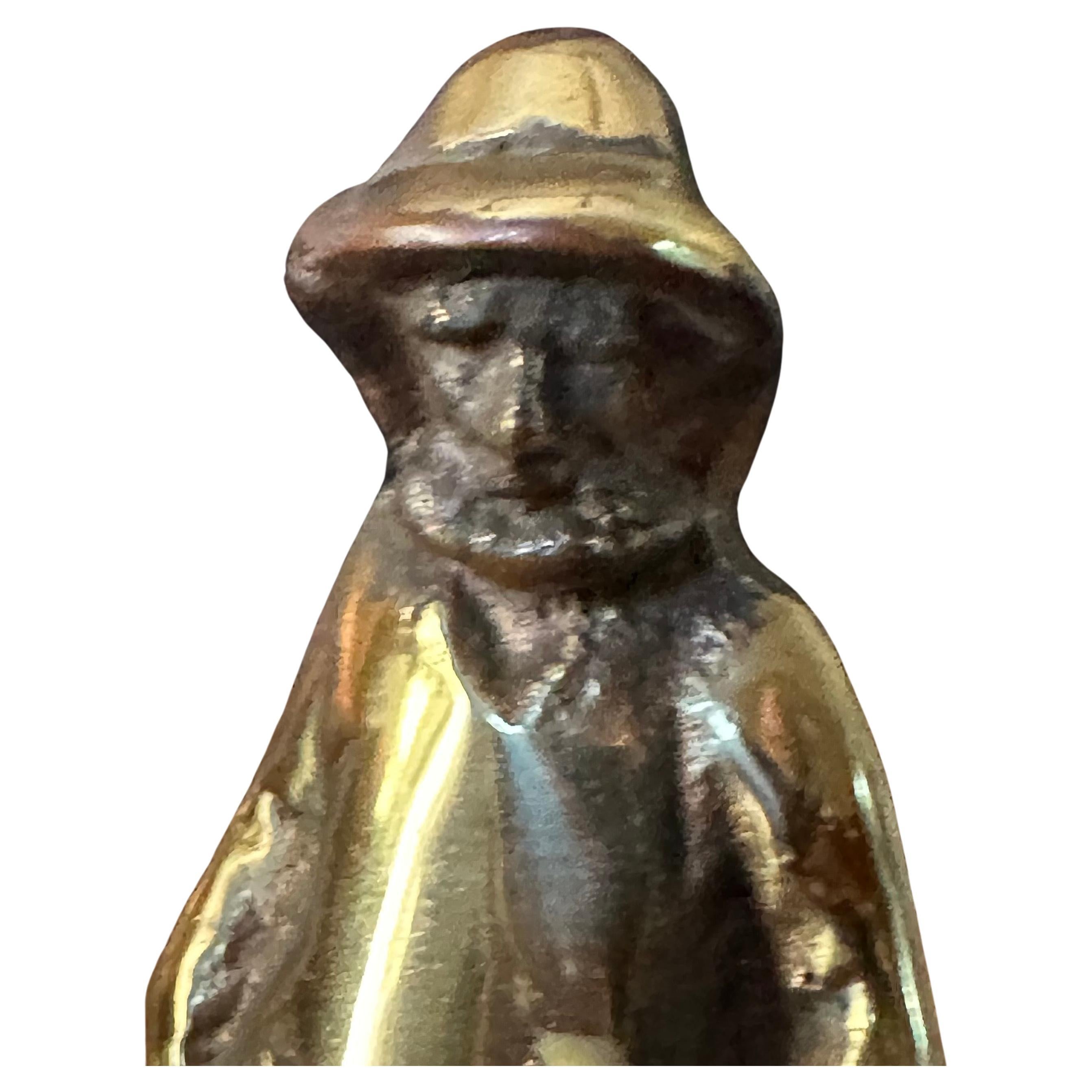 20ième siècle Sculpture / presse-papier en laiton patiné représentant un pêcheur en vente