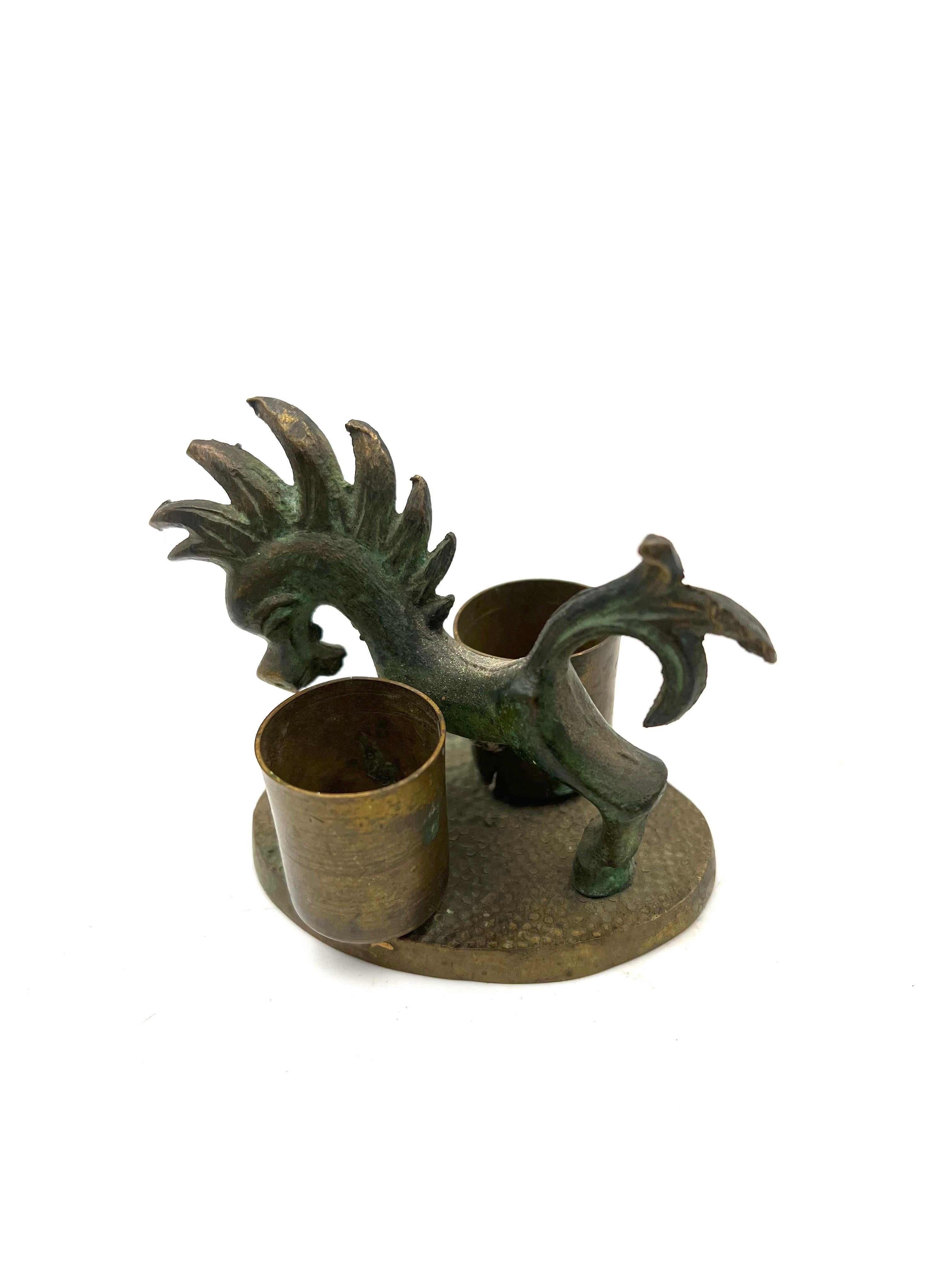 Whimsical petite horse sculpture candle holder in brass and bronze finish, circa 1950s.