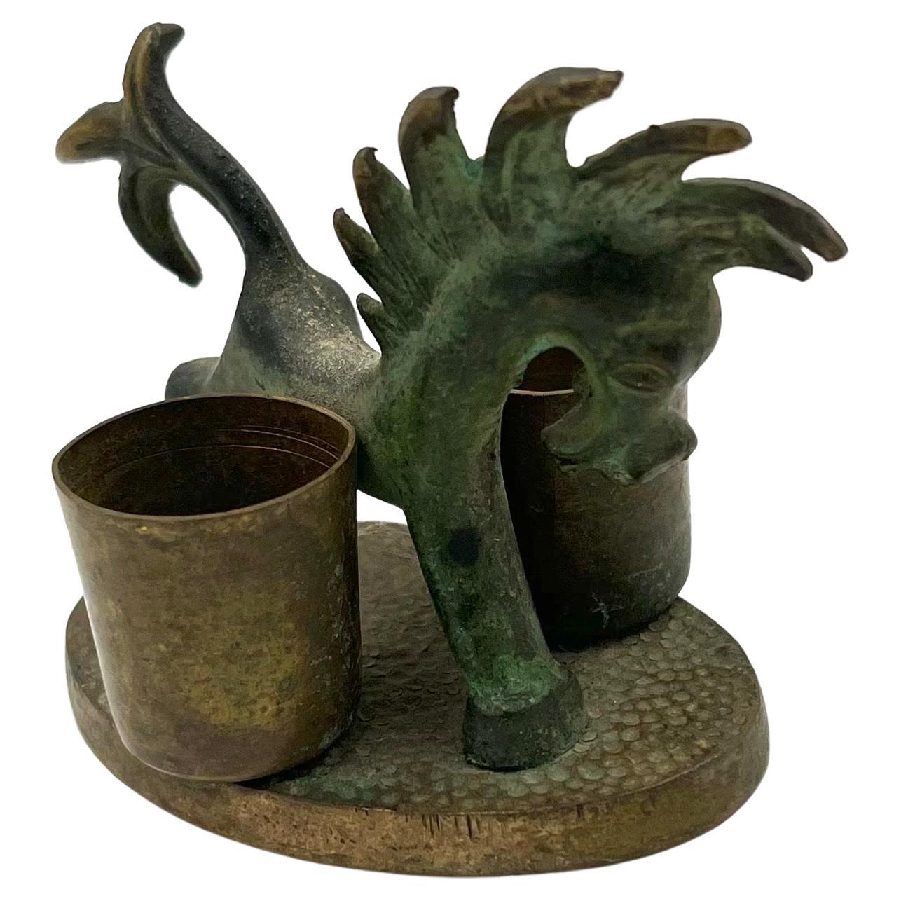 Scultura portacandele in bronzo patinato del metà del secolo scorso