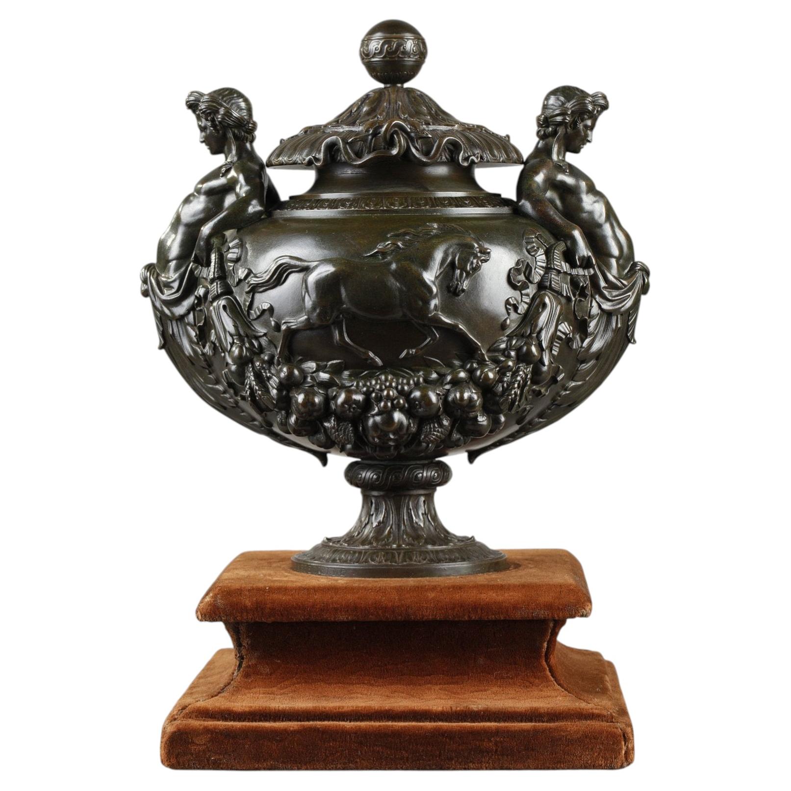 Patinated bronze covered cup, signed F. Barbedienne