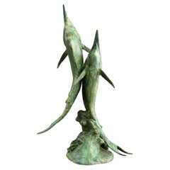 Fontaine à dauphin en bronze patiné, A.I.C.