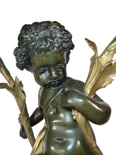 Patinated Bronze Figural Putti Candelabras