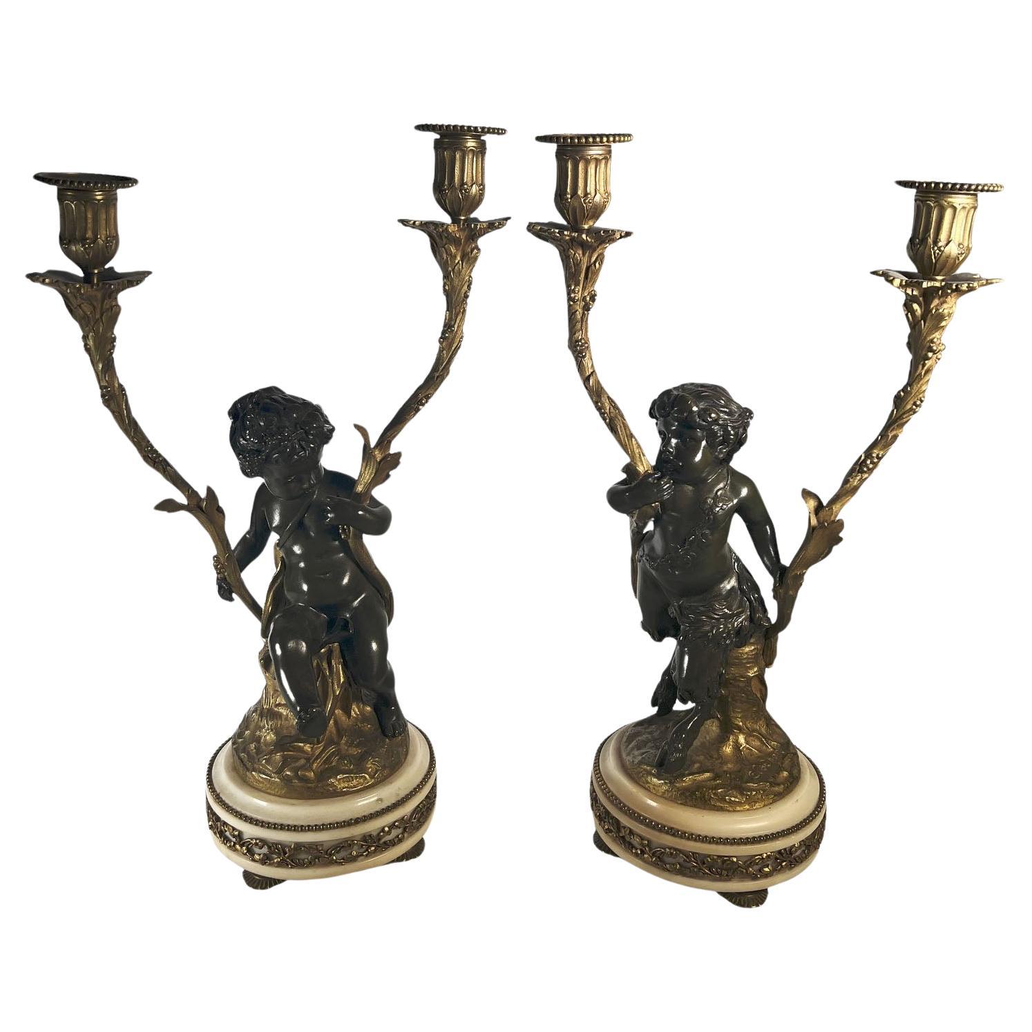 Patinated Bronze Figural Putti Candelabras