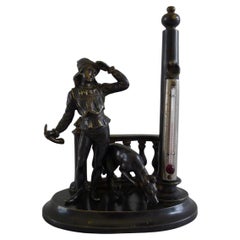 Patinated Bronze Figural Thermometer of a Medieval Youth and His Hound