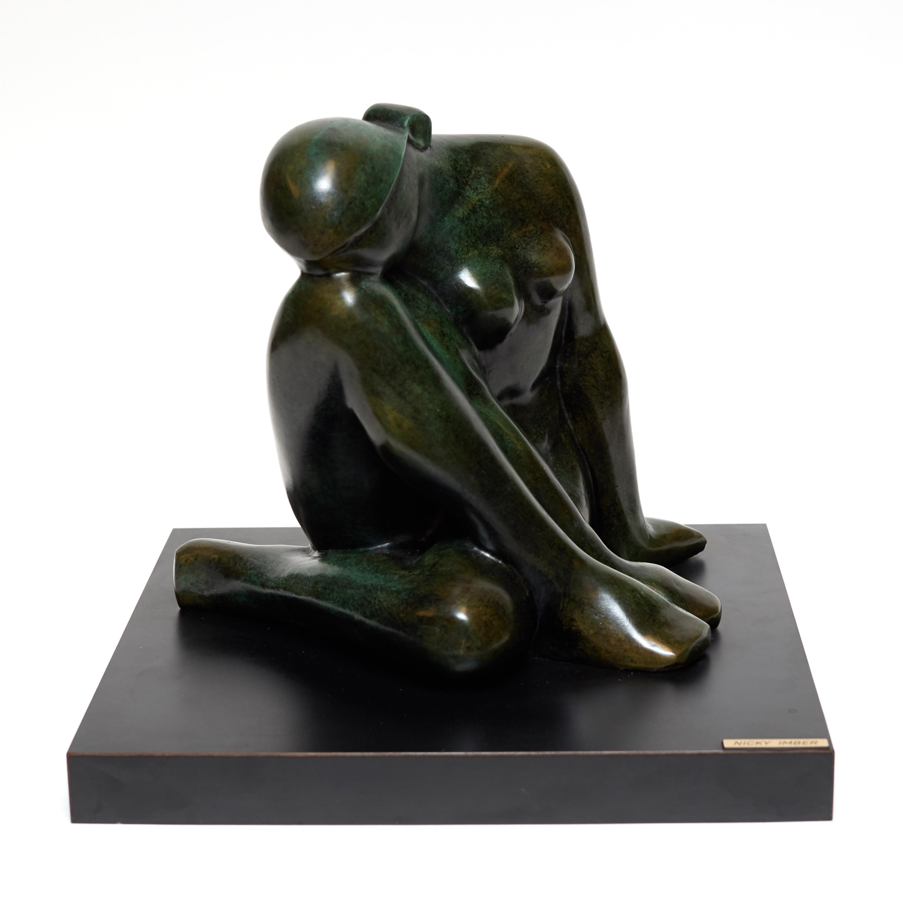 Patinated bronze sculpture of a seated female by the Austrian-born, Israeli artist, Nicky Imber (1920-1996).
   