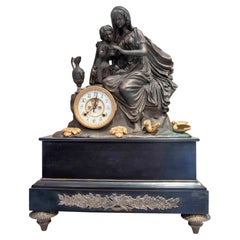 Patinated Bronze French Mantel Clock with Mother and Child Figure.