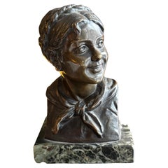 Escultura de bronce patinado "Busto de niña" de Dimanche