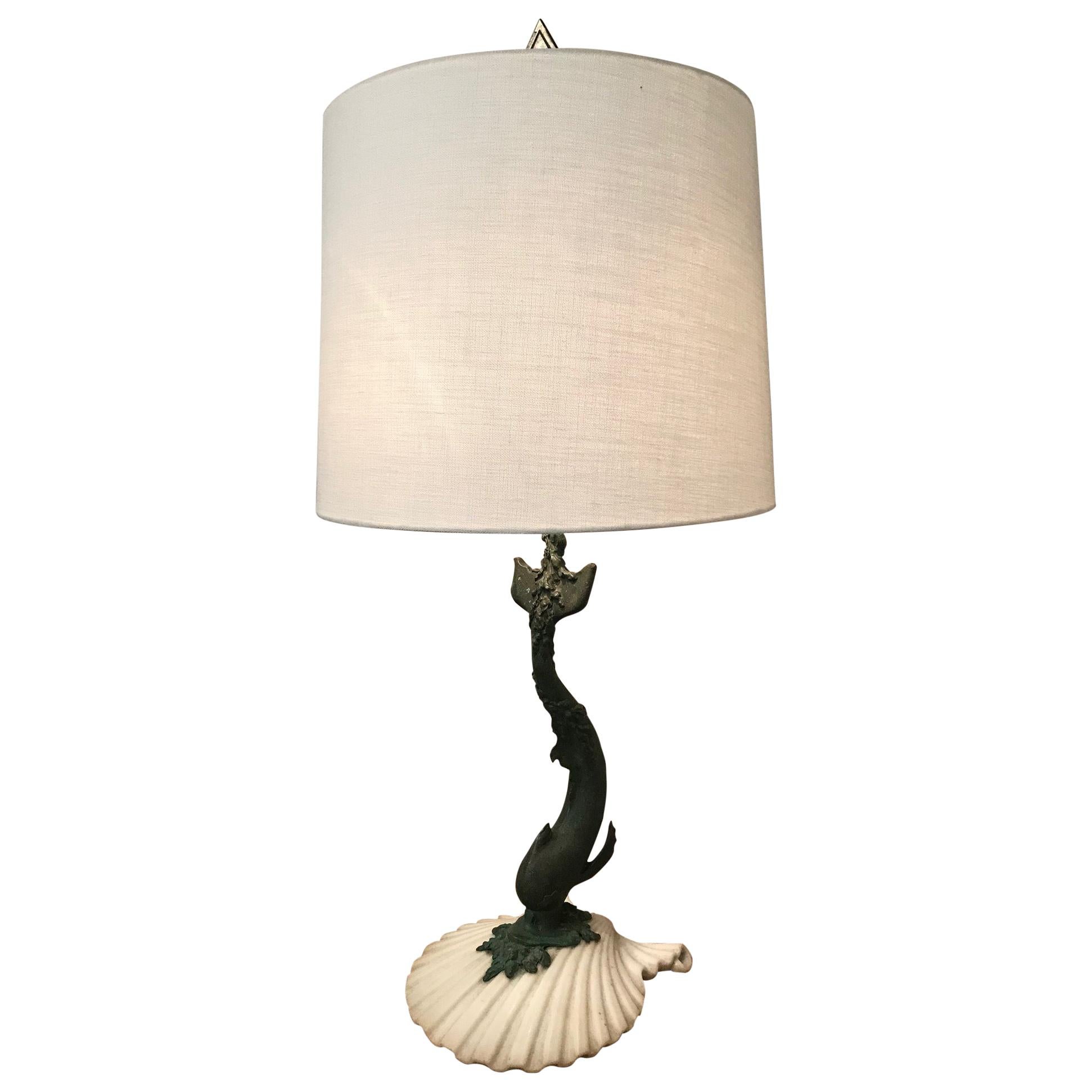 Patinated Bronze Grotto Style Sculptural Lamp Representing a Stylized Dolphin For Sale