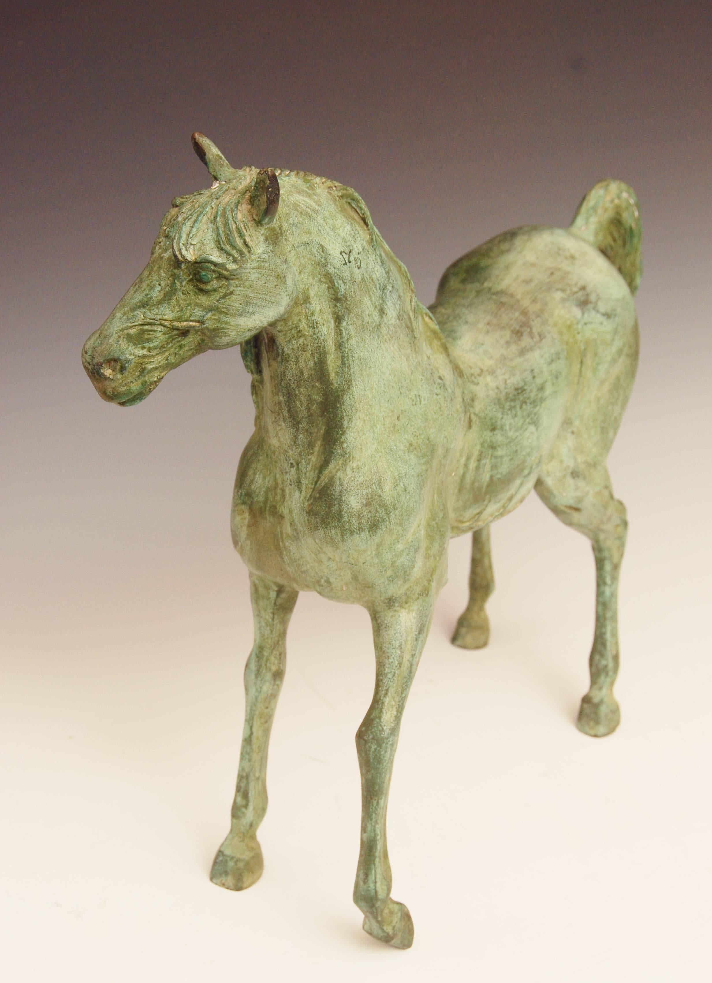 Late 20th Century Patinated Bronze Horse For Sale