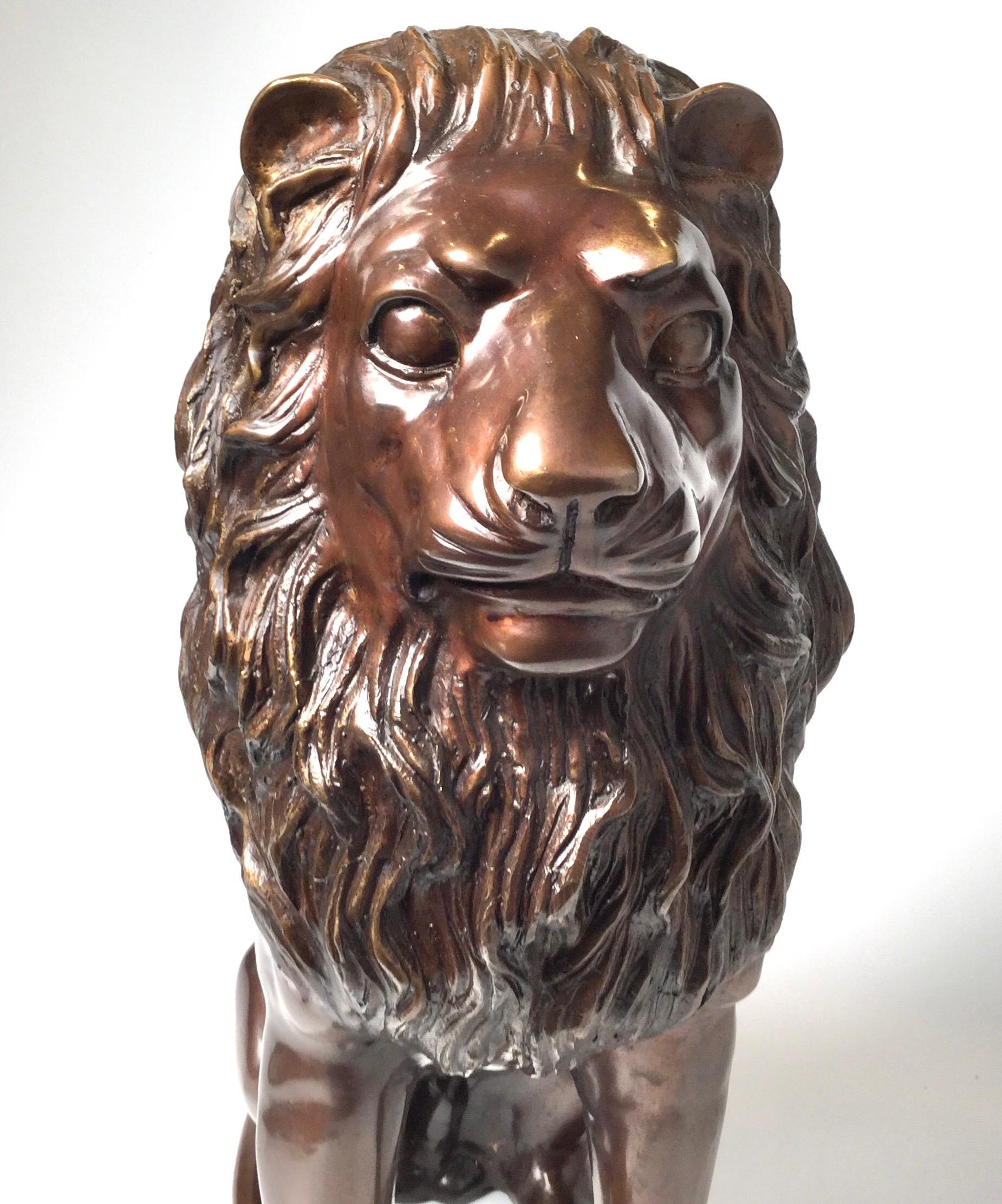 A beautifully cast bronze figure of a lion, with original patination.