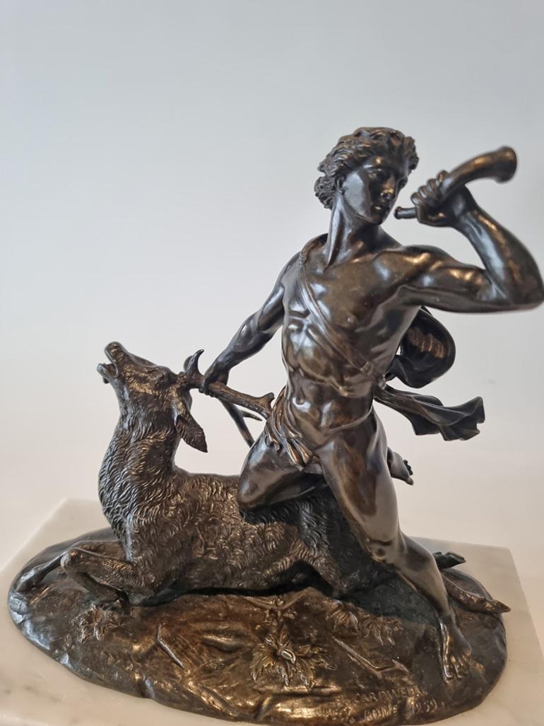 English Patinated Bronze model of a huntsman and a stag by Holme Cardwell For Sale