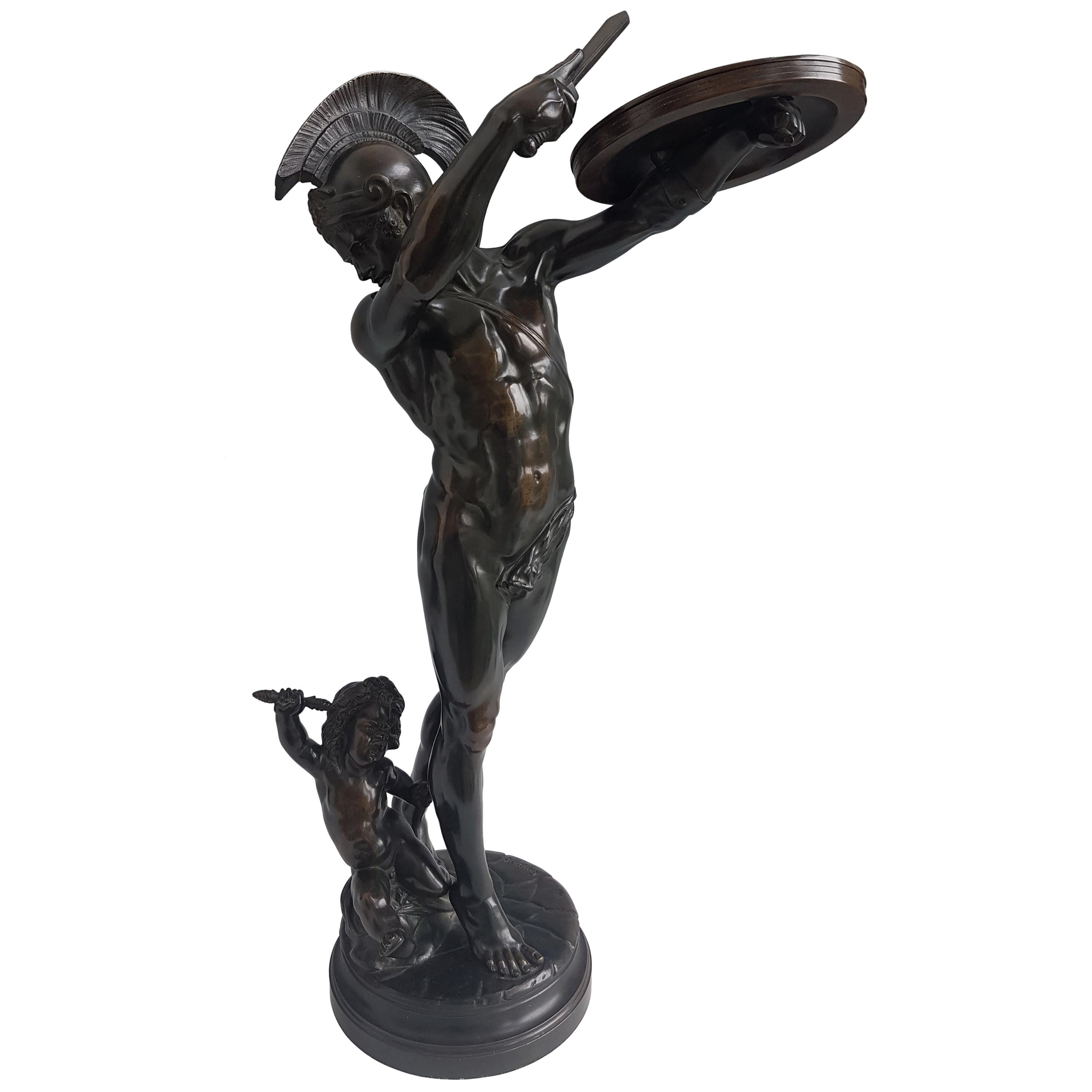 Bronze patiné représentant un gladiateur et un cugnot signé Jupiter