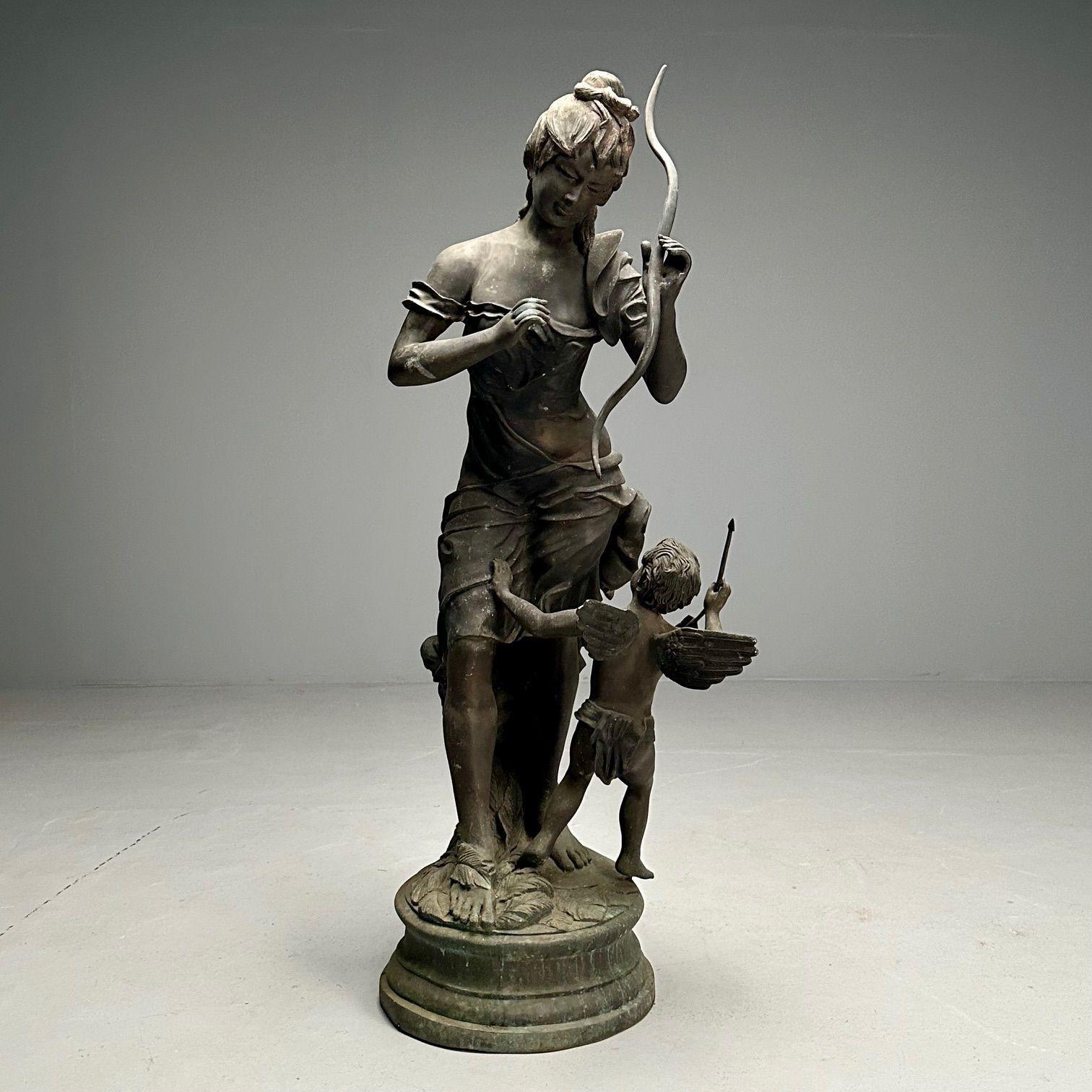 Patinated bronze statue of Venus disarming Cupid. Venus playfully holding Cupid's bow while Cupid is mid-air looking along. 
 
Purchased at Tepper Galleries in NYC and Shipped to São Paulo, Brazil, This life sized well defined statue was handed down