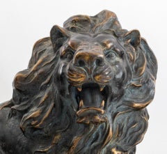 Patinated Bronze Reclining Lion Sculptures, Pair