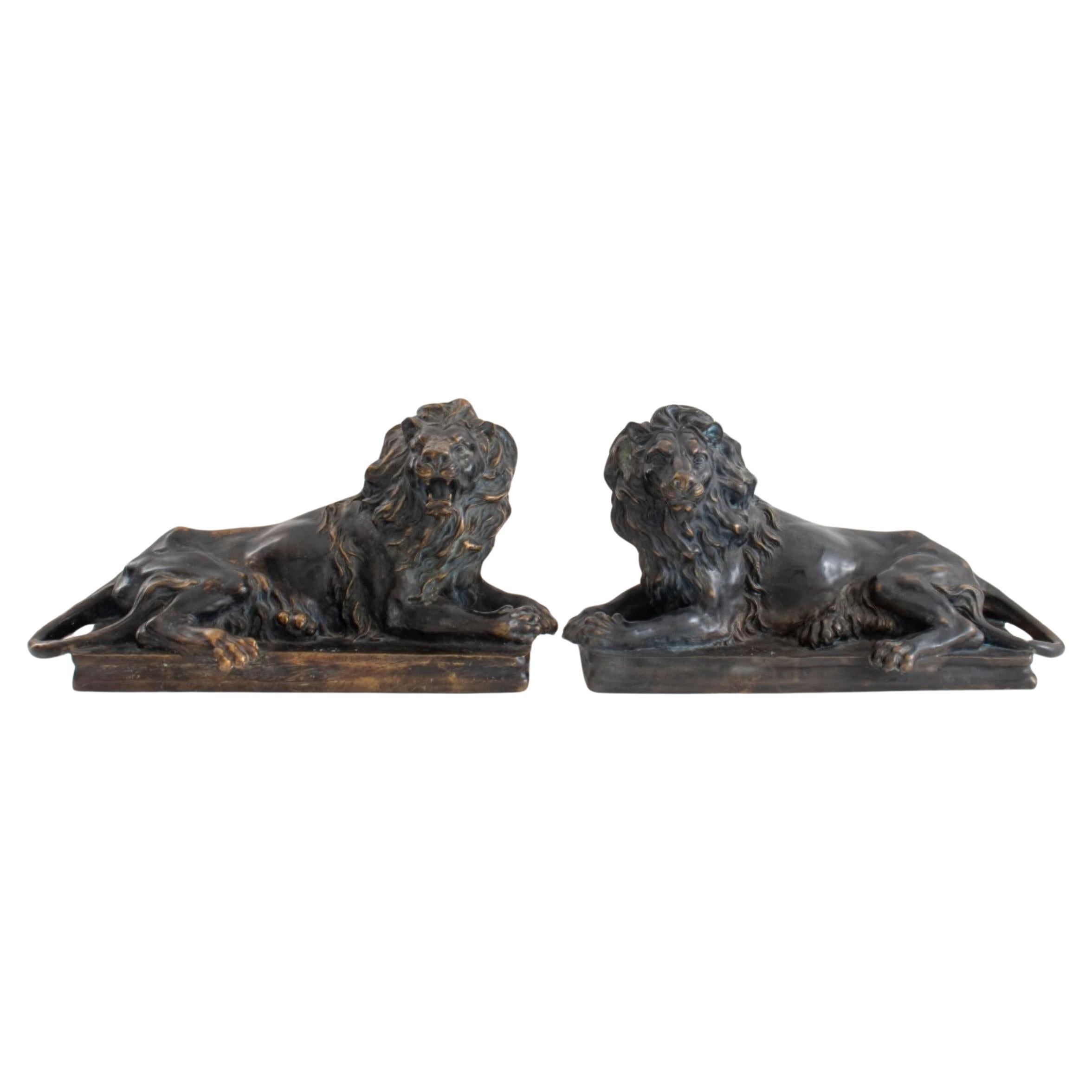 Patinated Bronze Reclining Lion Sculptures, Pair