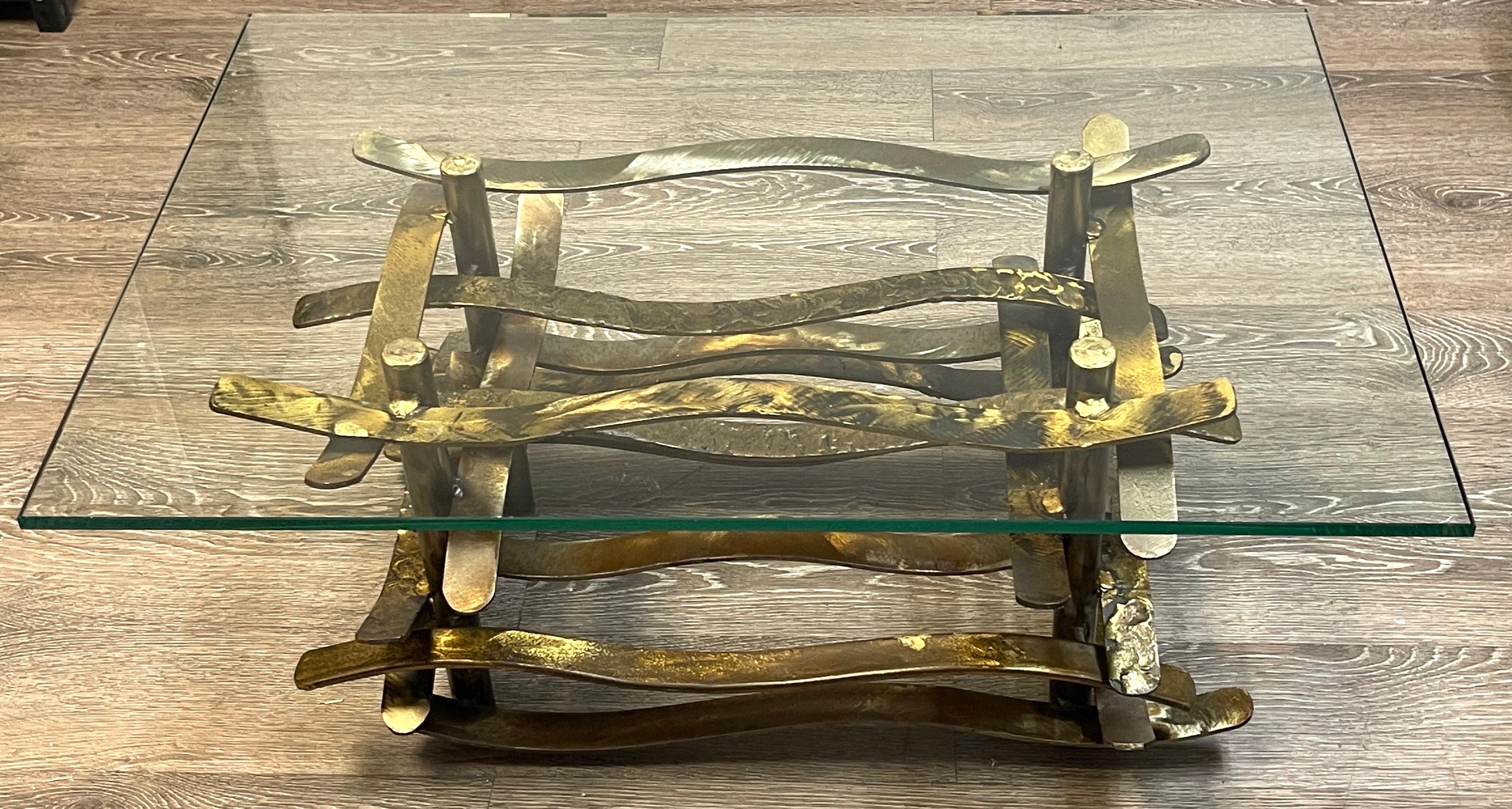 Patinated Bronze 'Ribbon' coffee table by Silas Seandel, 1978

A fine example of Seandel's fluid and architectural bronze sculptural work.
Signed on an upper 2nd tier corner 'Silas Seandel, Copyright '78' in script.

Shown with a 24-Inch x