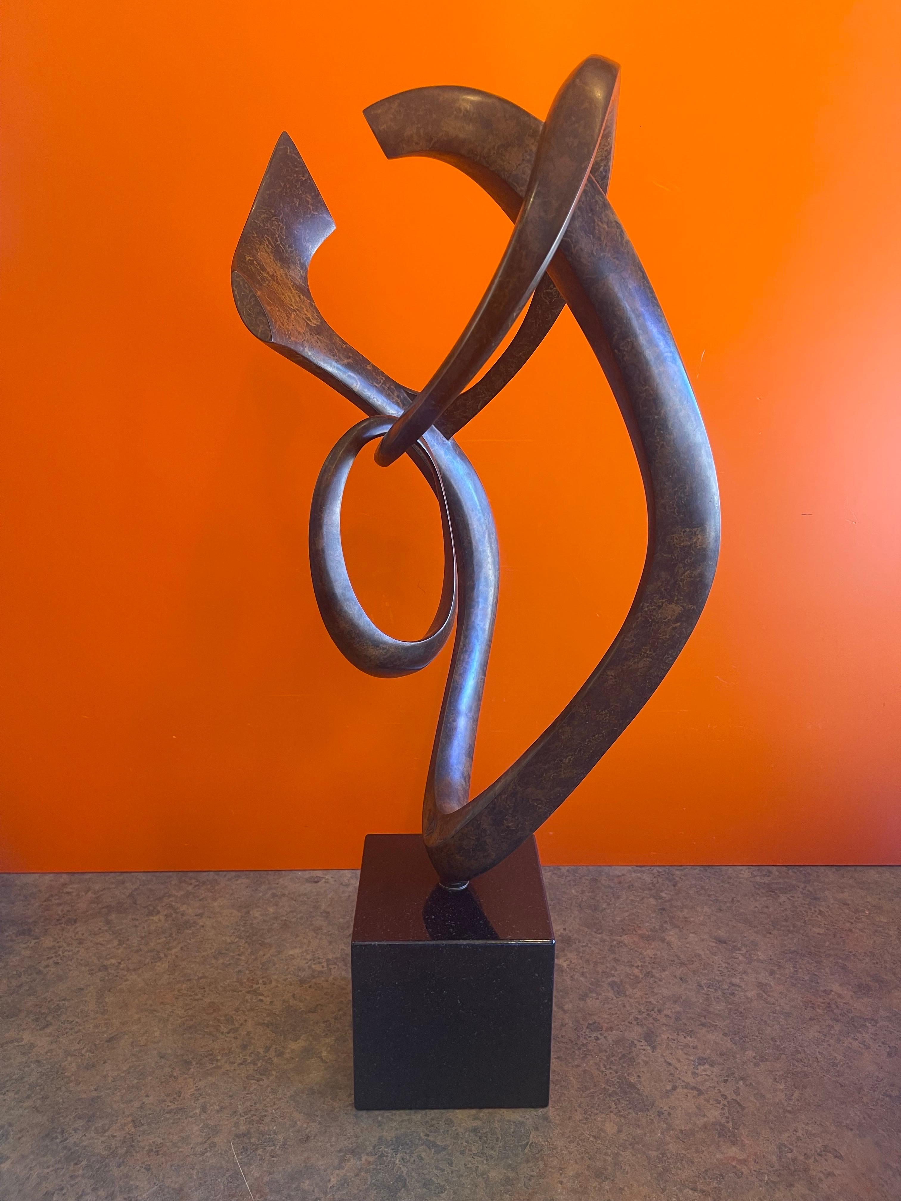 American Patinated Bronze Rotating Abstract Sculpture on Marble Base by Dennis Sohocki