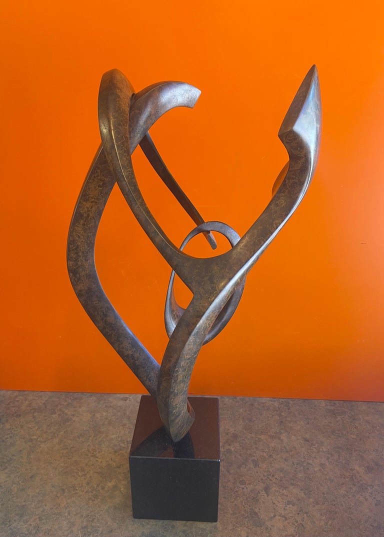 Patinated Bronze Rotating Abstract Sculpture on Marble Base by Dennis