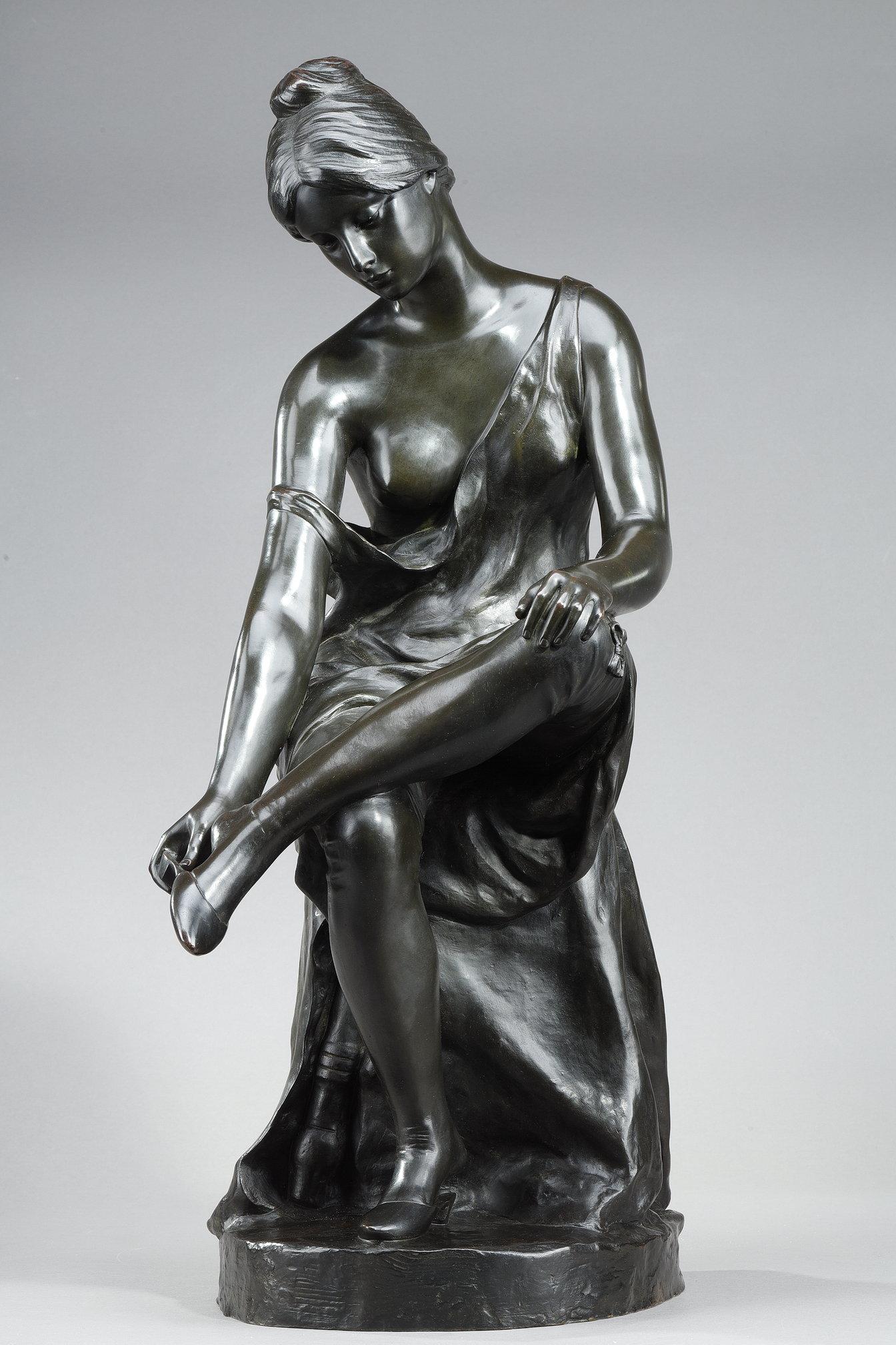 Patinated bronze statue of a 