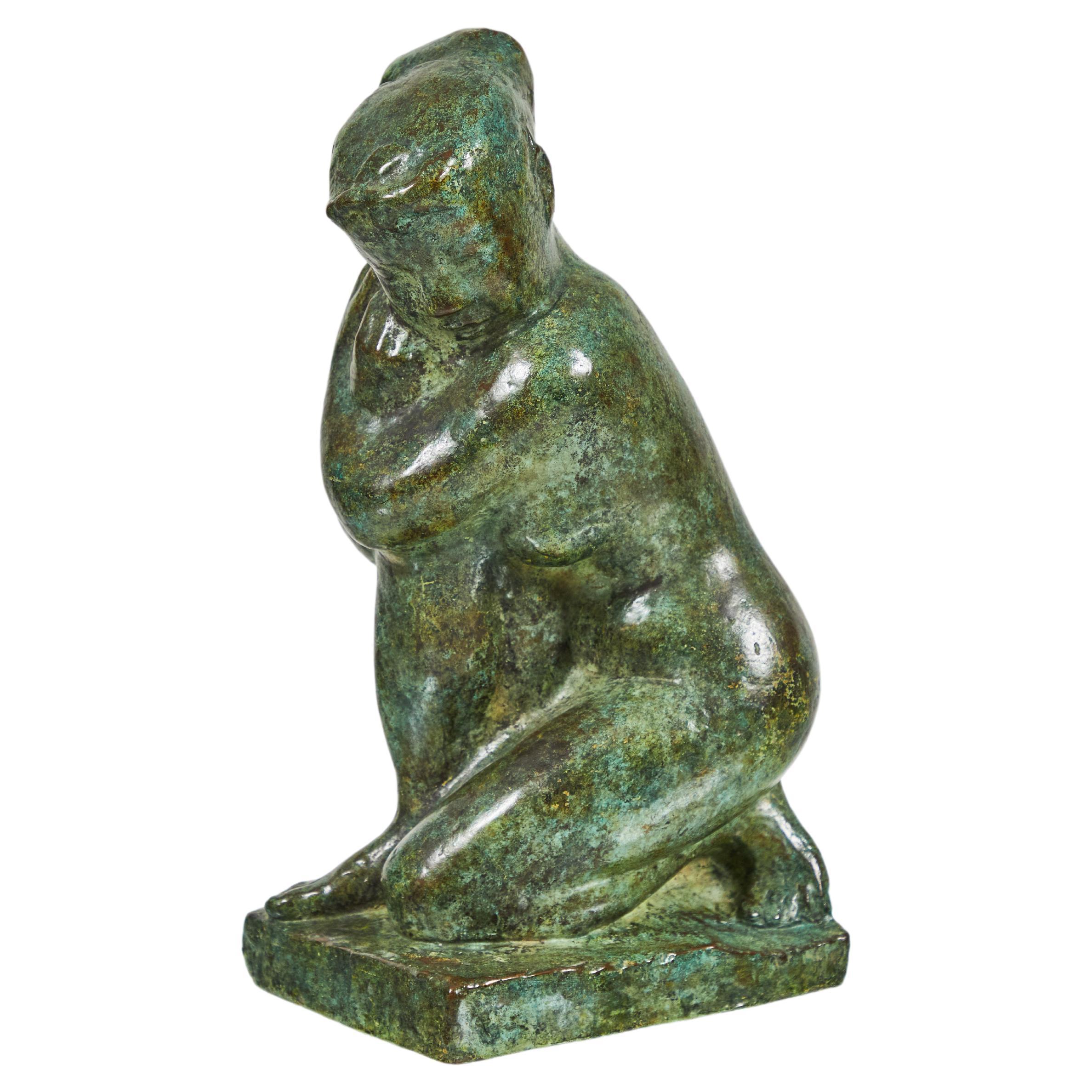Sculpture en bronze patiné d'une femme agenouillée par Guy Charles Revol (1912-1991)