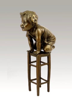 Patinated Bronze Sculpture of a Seated Child, Art Nouveau style, 20th Century