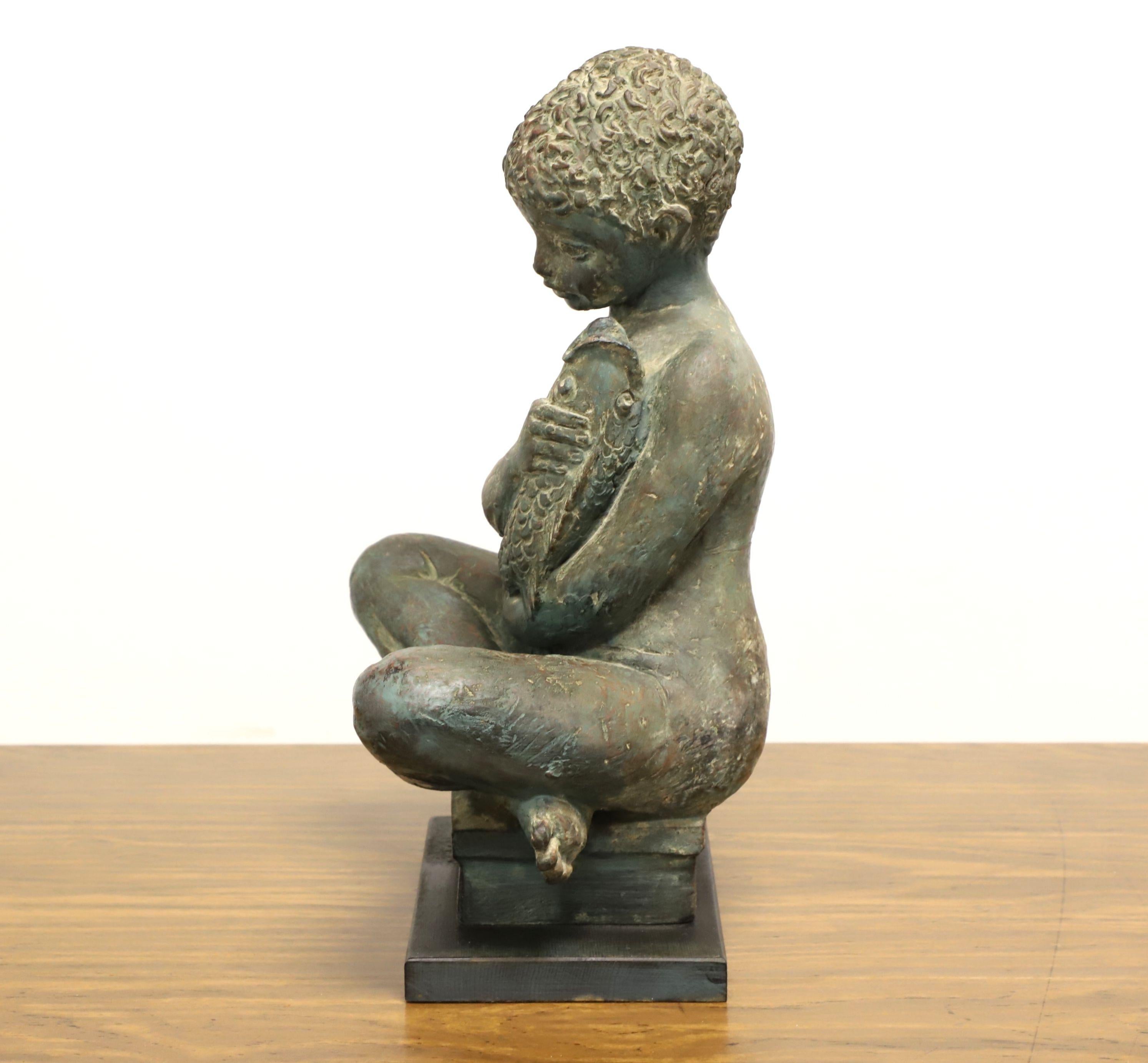 African Patinated Bronze Seated Boy Holding Fish Sculpture