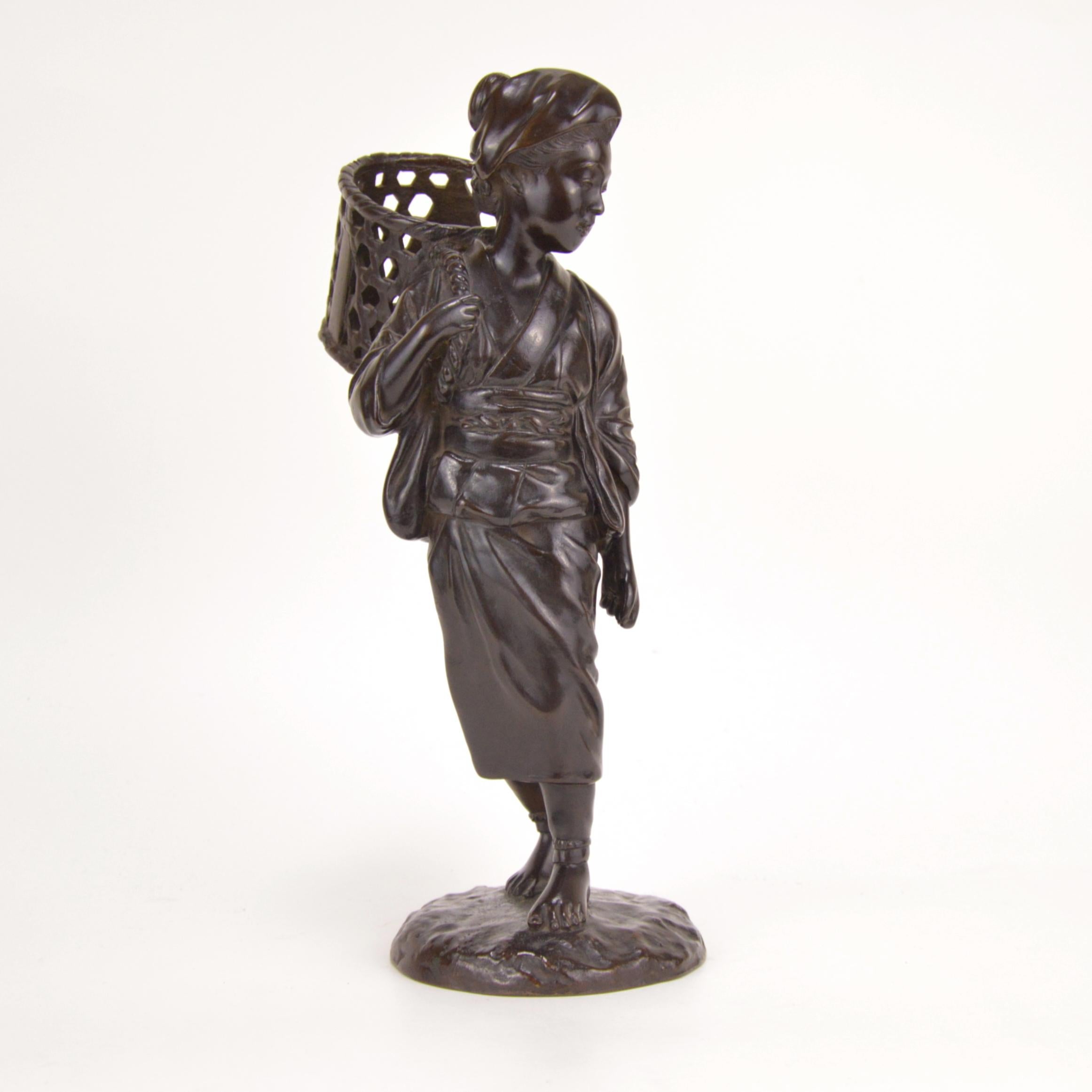 Meiji Patinated Bronze Statue Representing a Peasant Girl Holding a Basket Japan, 1900 For Sale