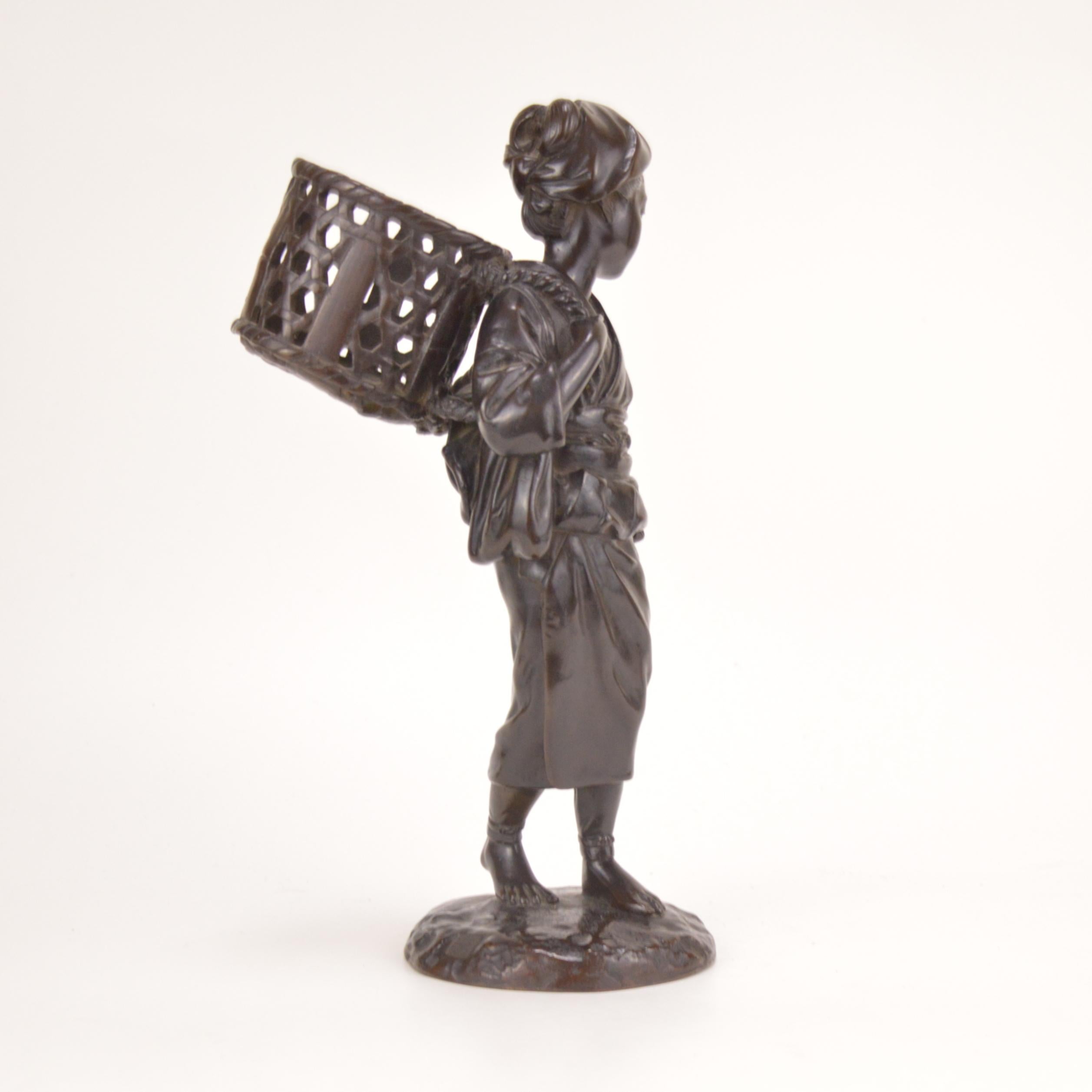 Japanese Patinated Bronze Statue Representing a Peasant Girl Holding a Basket Japan, 1900 For Sale
